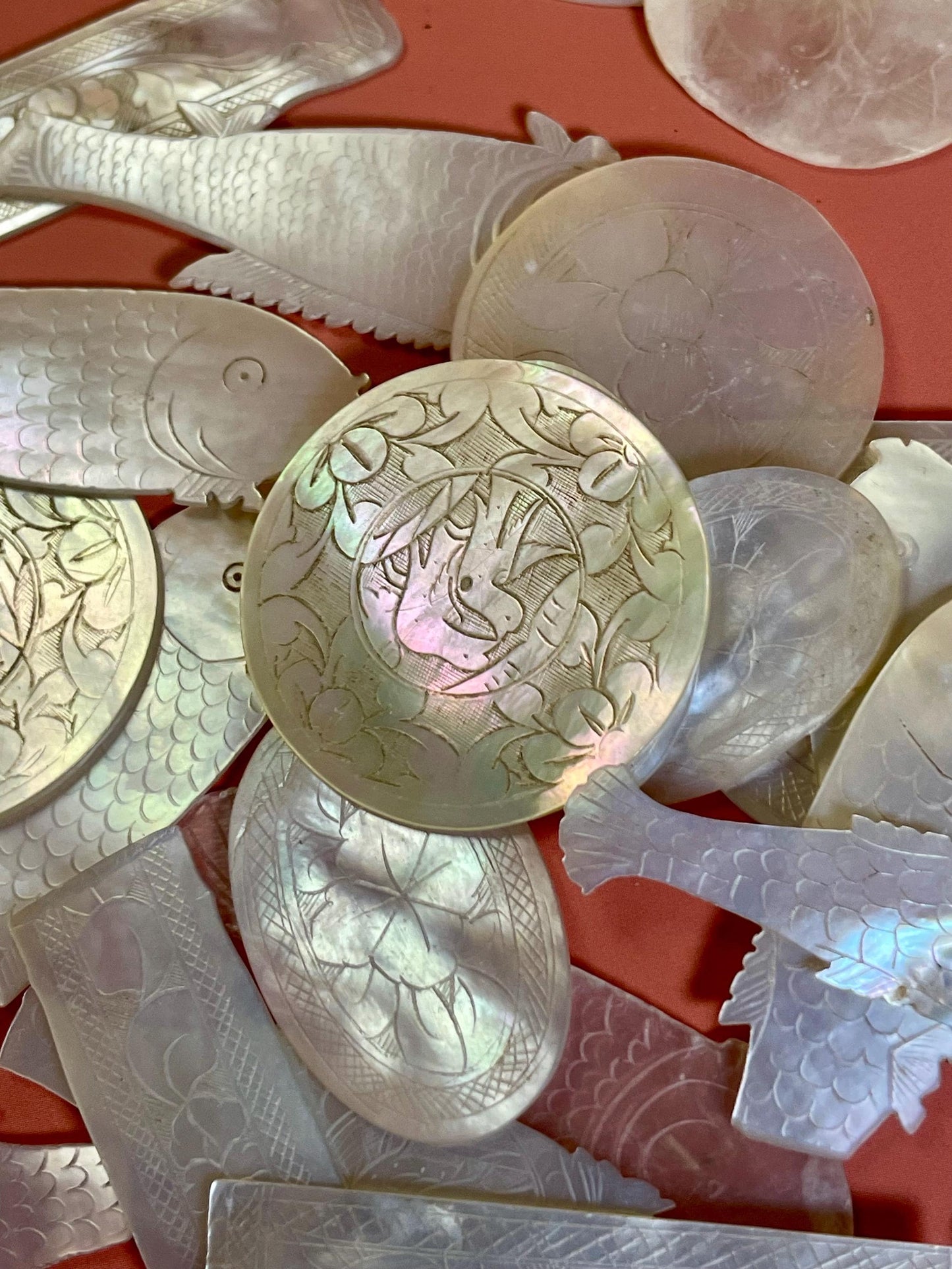 Assorted lot of mother of pearl chips. Approx 1.5 inches