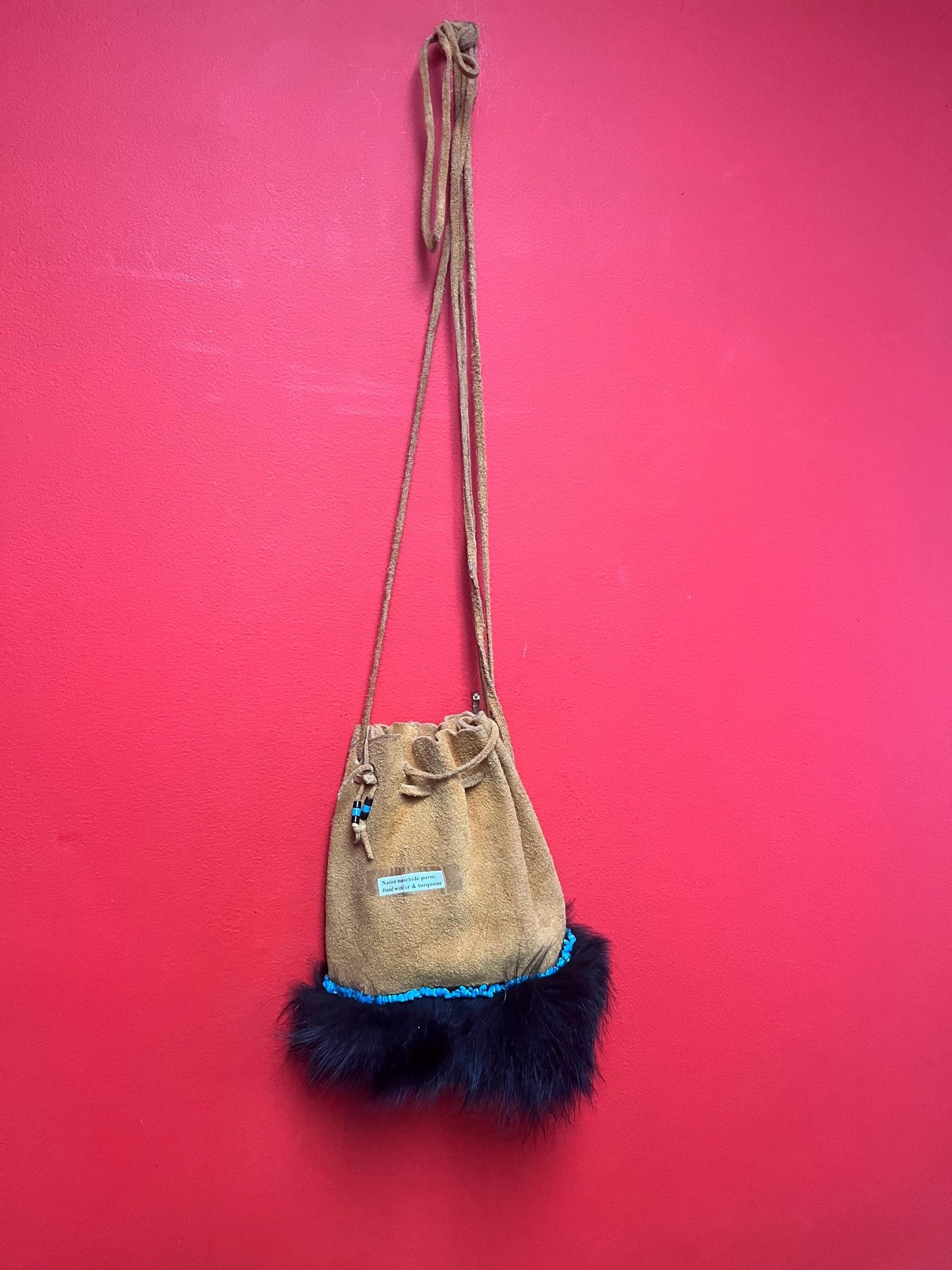 stunning American native moosehide purse lined with fur and turquoise pretty good condition see photos- 34 inches total and bag 10 inches