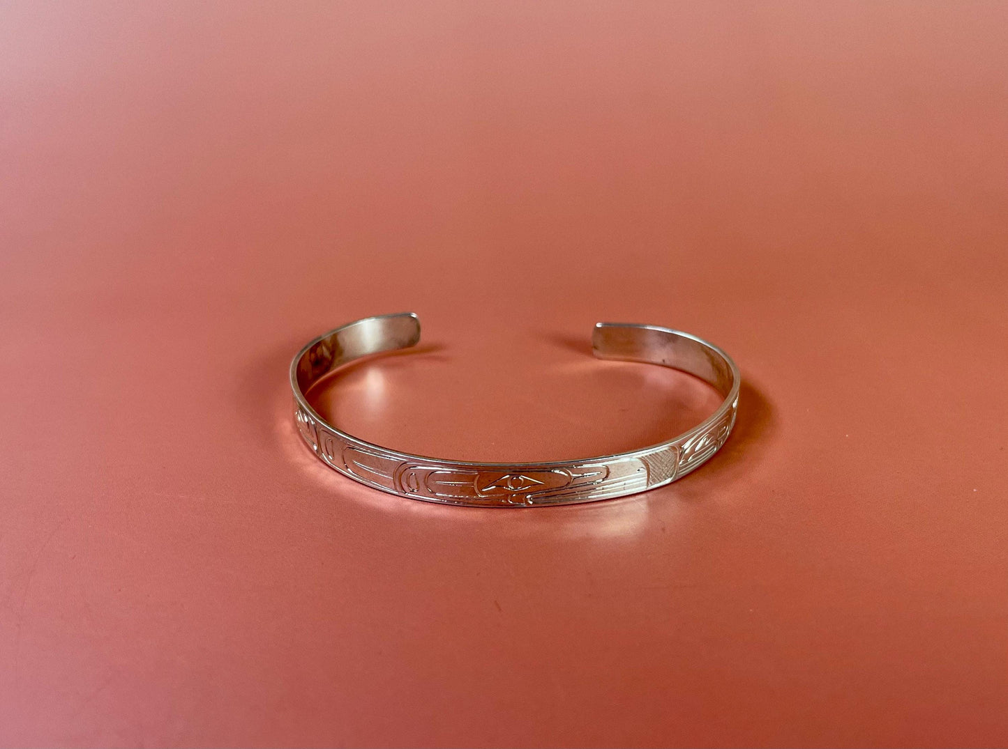 Stunning 2 1/2 inch wide indigenous first nations northwest coast Sterling Tony Hunt eagle and salmon bracelet amazing detail