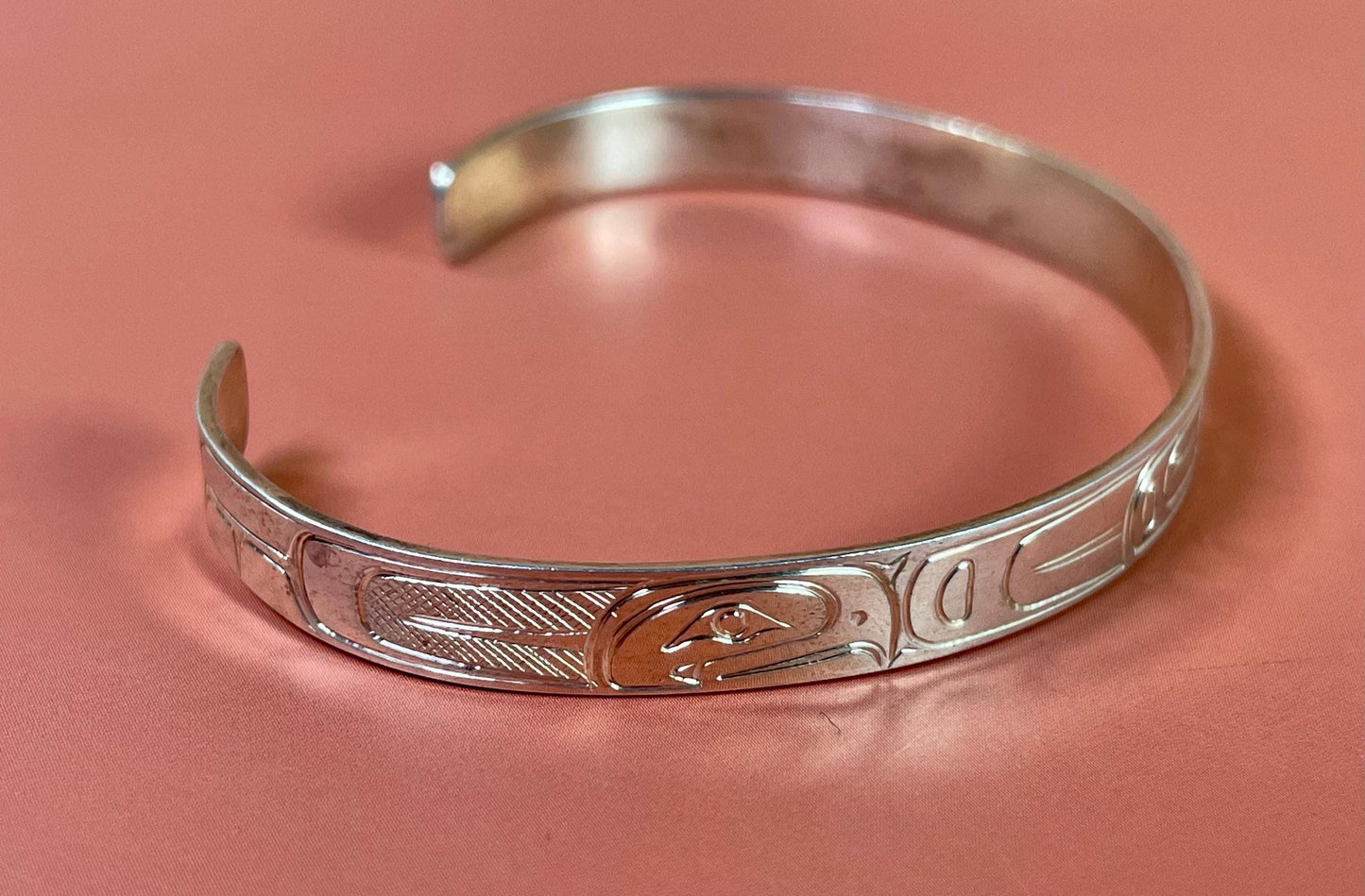 Stunning 2 1/2 inch wide indigenous first nations northwest coast Sterling Tony Hunt eagle and salmon bracelet amazing detail