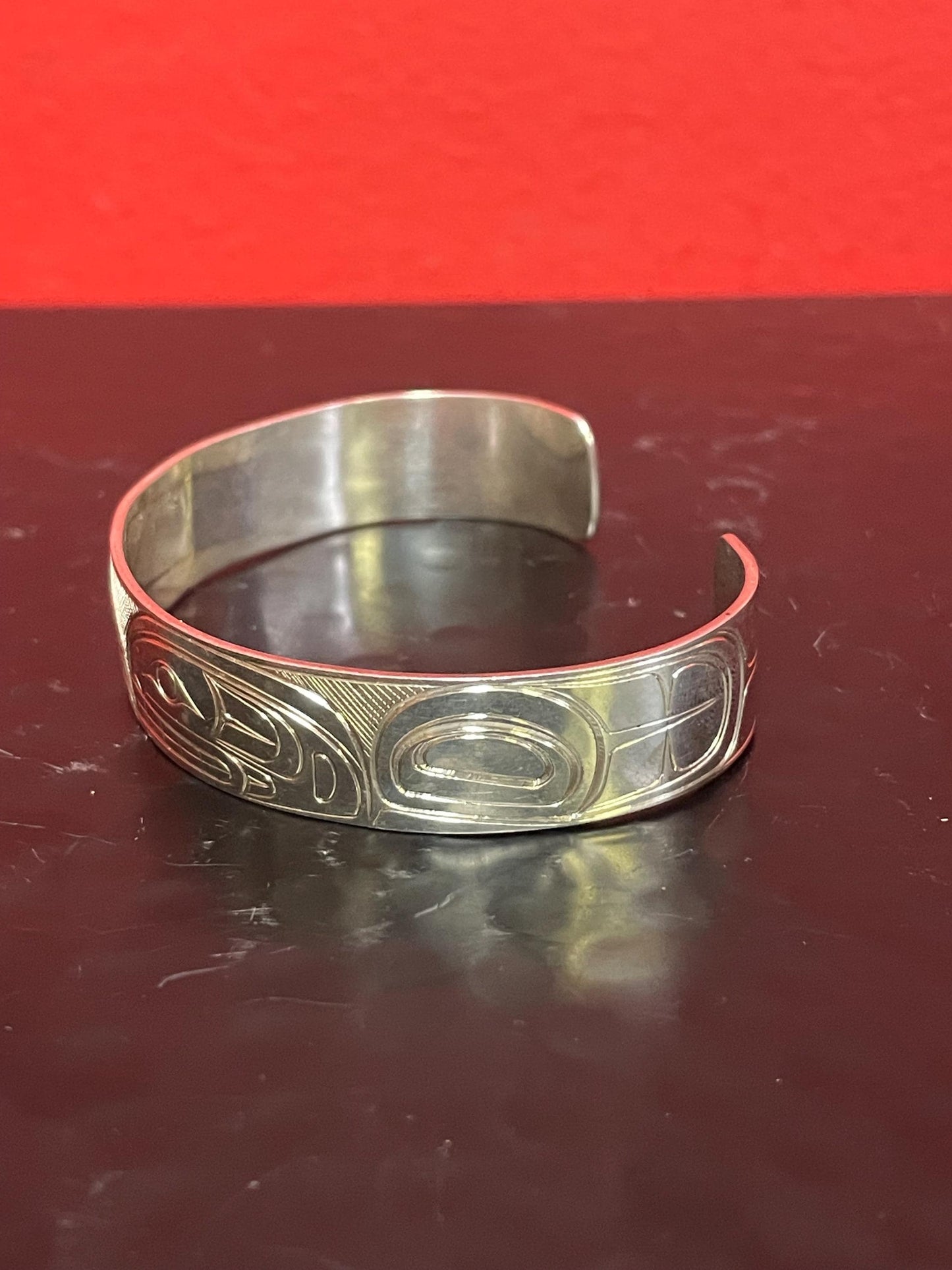 Stunning 2 1/2 inch wide indigenous first nations northwest coast Sterling Tony Hunt thunderbird bracelet amazing detail