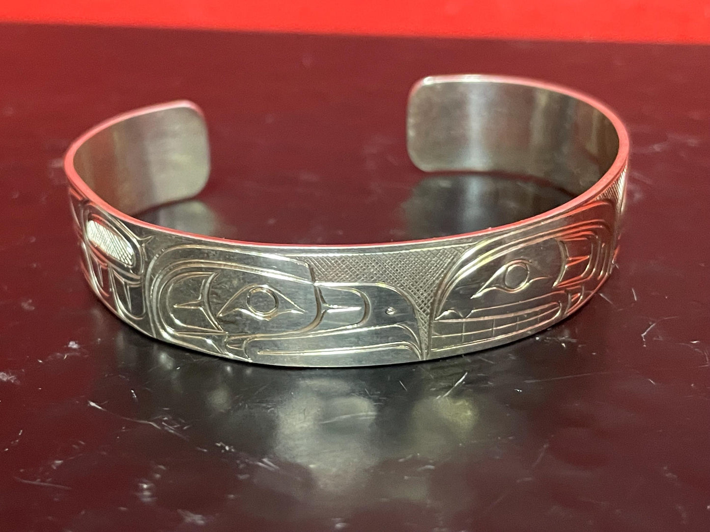 Stunning 2 1/2 inch wide indigenous first nations northwest coast Sterling Tony Hunt thunderbird bracelet amazing detail