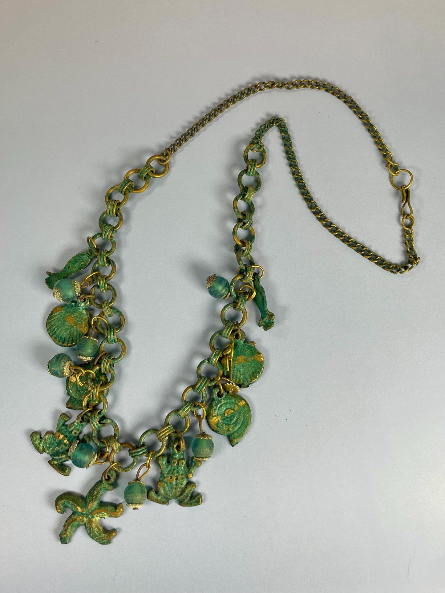 Lovely ocean themed bronze necklace - approximately 25 inches long very unusual and cool