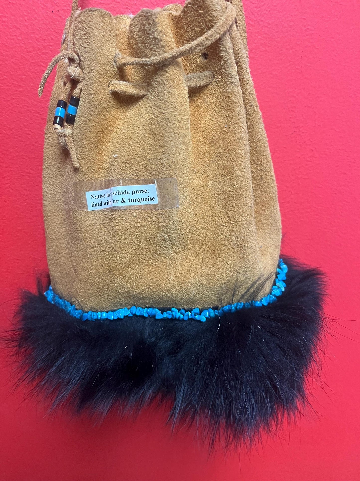 stunning American native moosehide purse lined with fur and turquoise pretty good condition see photos- 34 inches total and bag 10 inches