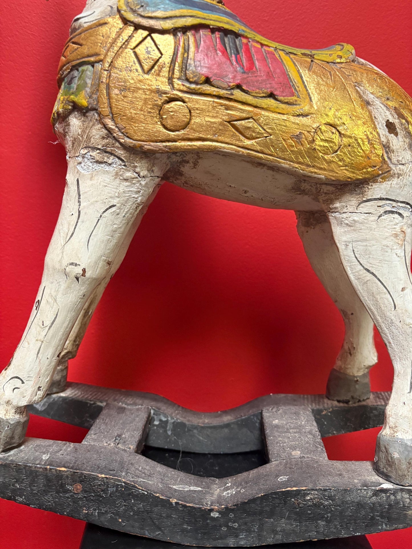 19 x 21“ high antique primitive wooden polychrome painted rocking horse in used condition see photos perfect home or cabin decor