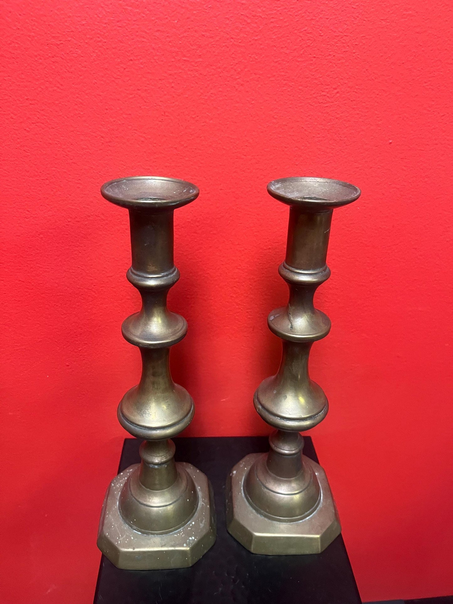 Beautiful antique brass candlesticks 11 inches tall and stable on the table - lovely pair