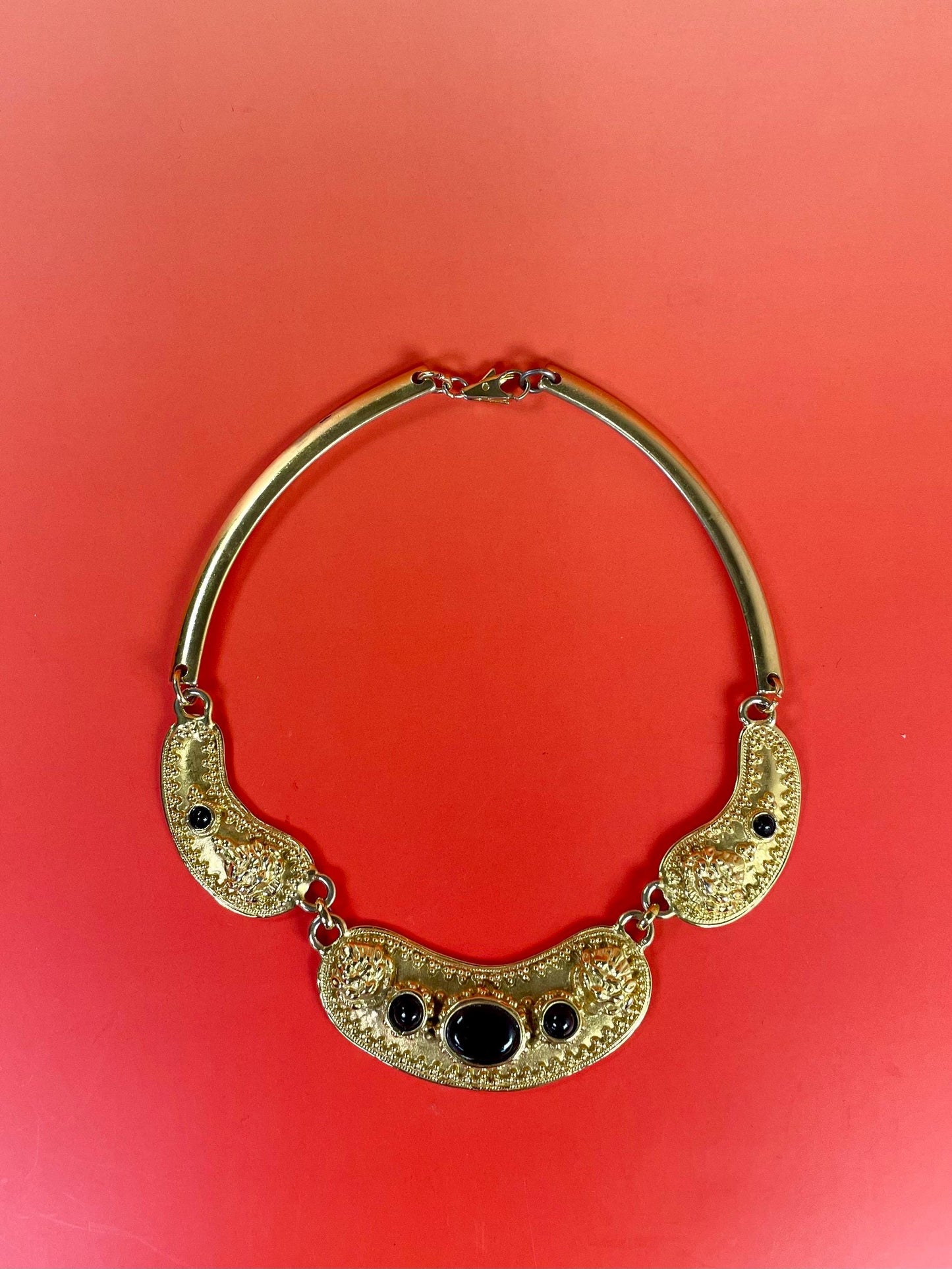 Gold-Tone Collar Necklace with Textured Details & Black Stone Accents