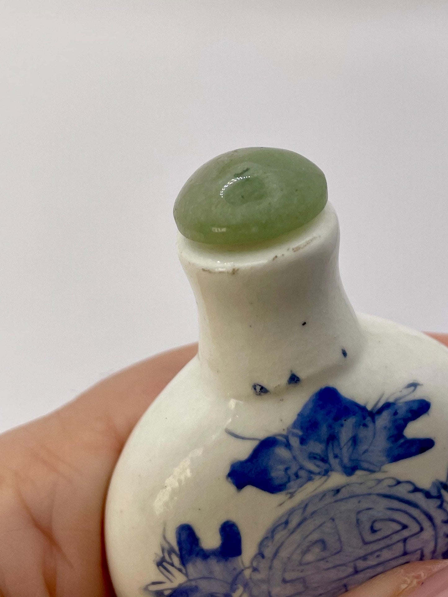 Chinese painted porcelain snuff bottle with jade top
