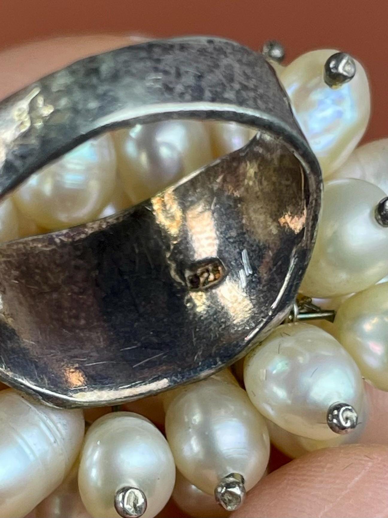 Beautiful sterling silver and Pearl ring size 5.5 Unique and beautiful amazing value
