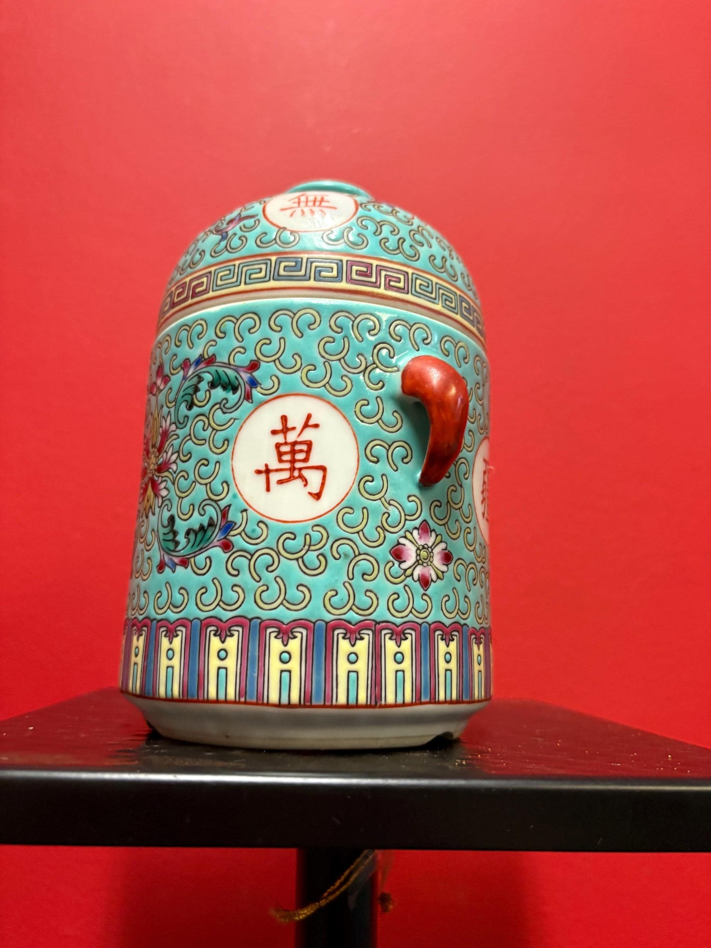 Lovely mid 20 century Chinese vert rose porcelain cannister with lovely handles 7 inches tall and good condition