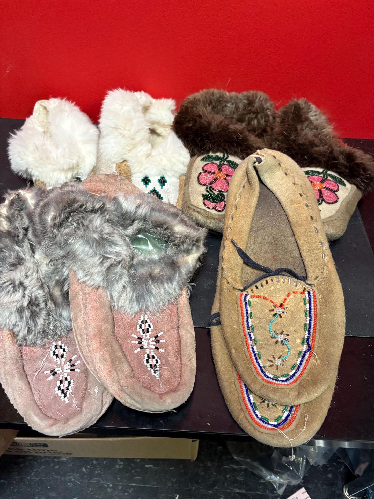 Cool lot of four pairs indigenous first nations leather and beaded moccasin shoes  all in as is condition perfect for decoration or collect