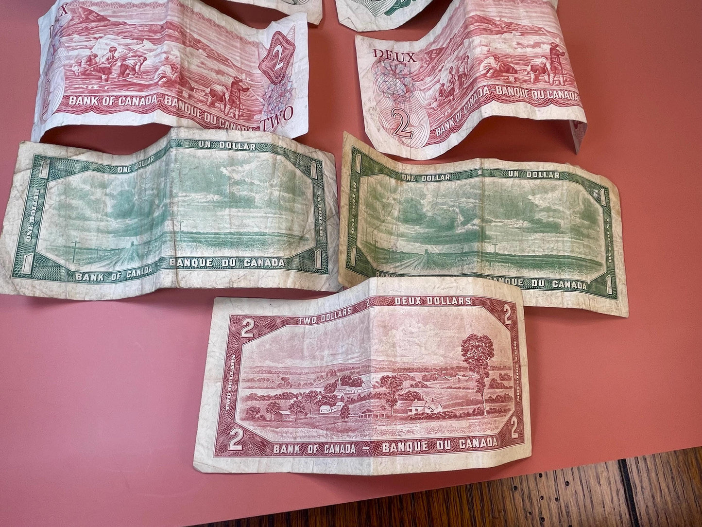 Old Canadian currency One and Two Dollar Bills