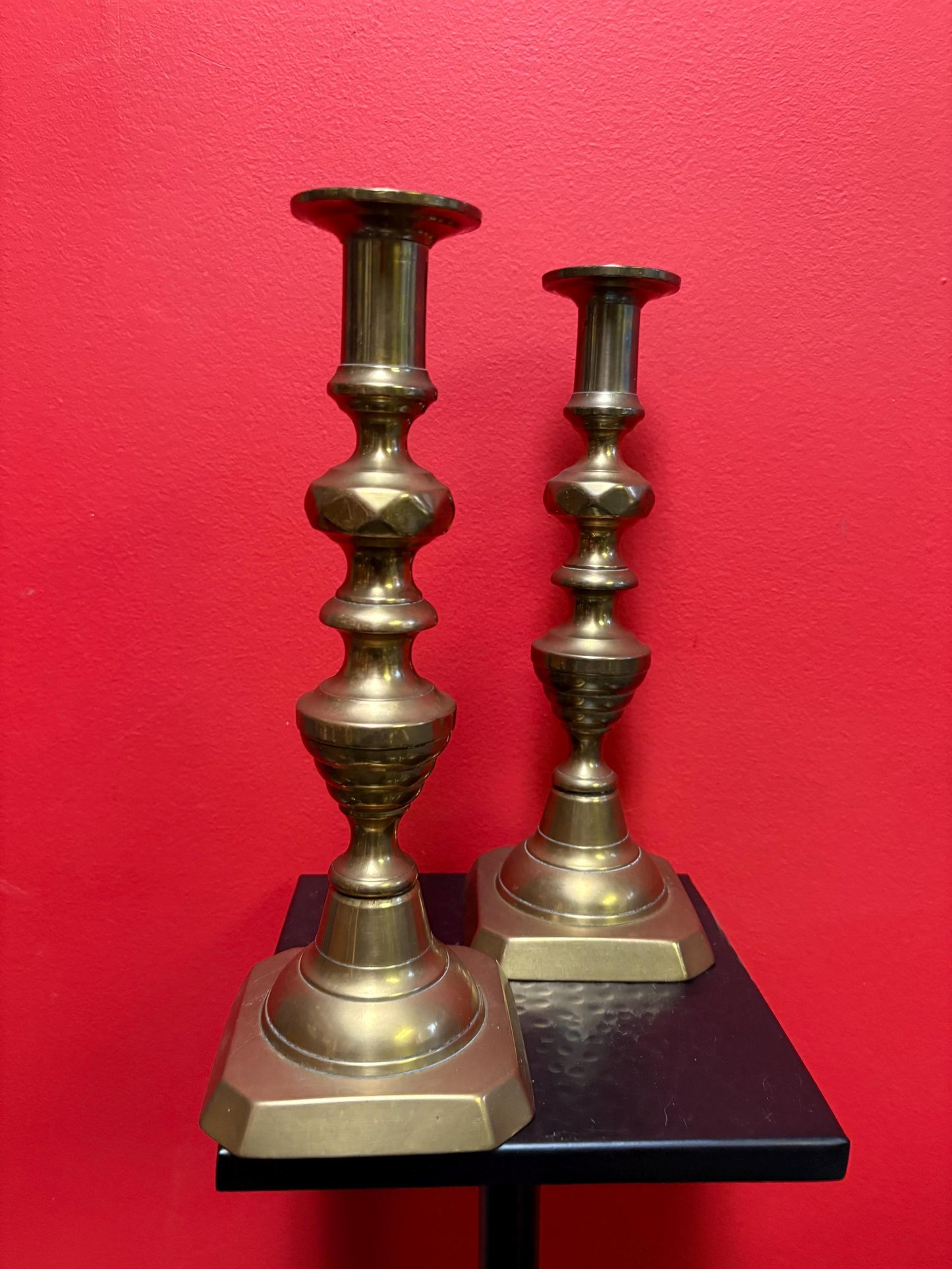 Beautiful 11 inch tall antique brass candlesticks with the original lifters good condition and stable