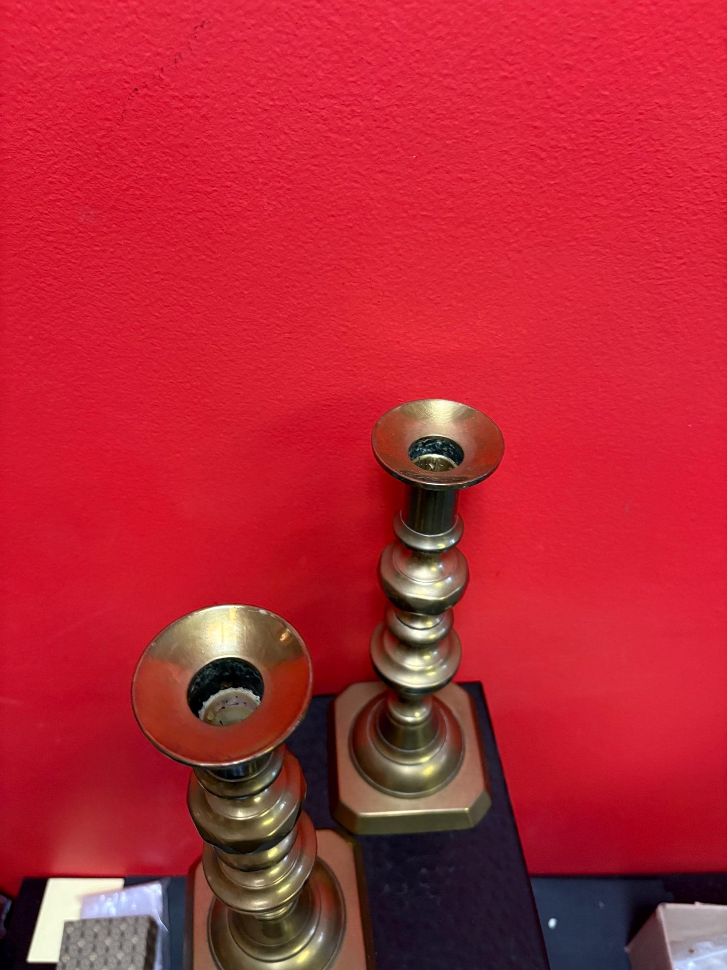 Beautiful 11 inch tall antique brass candlesticks with the original lifters good condition and stable