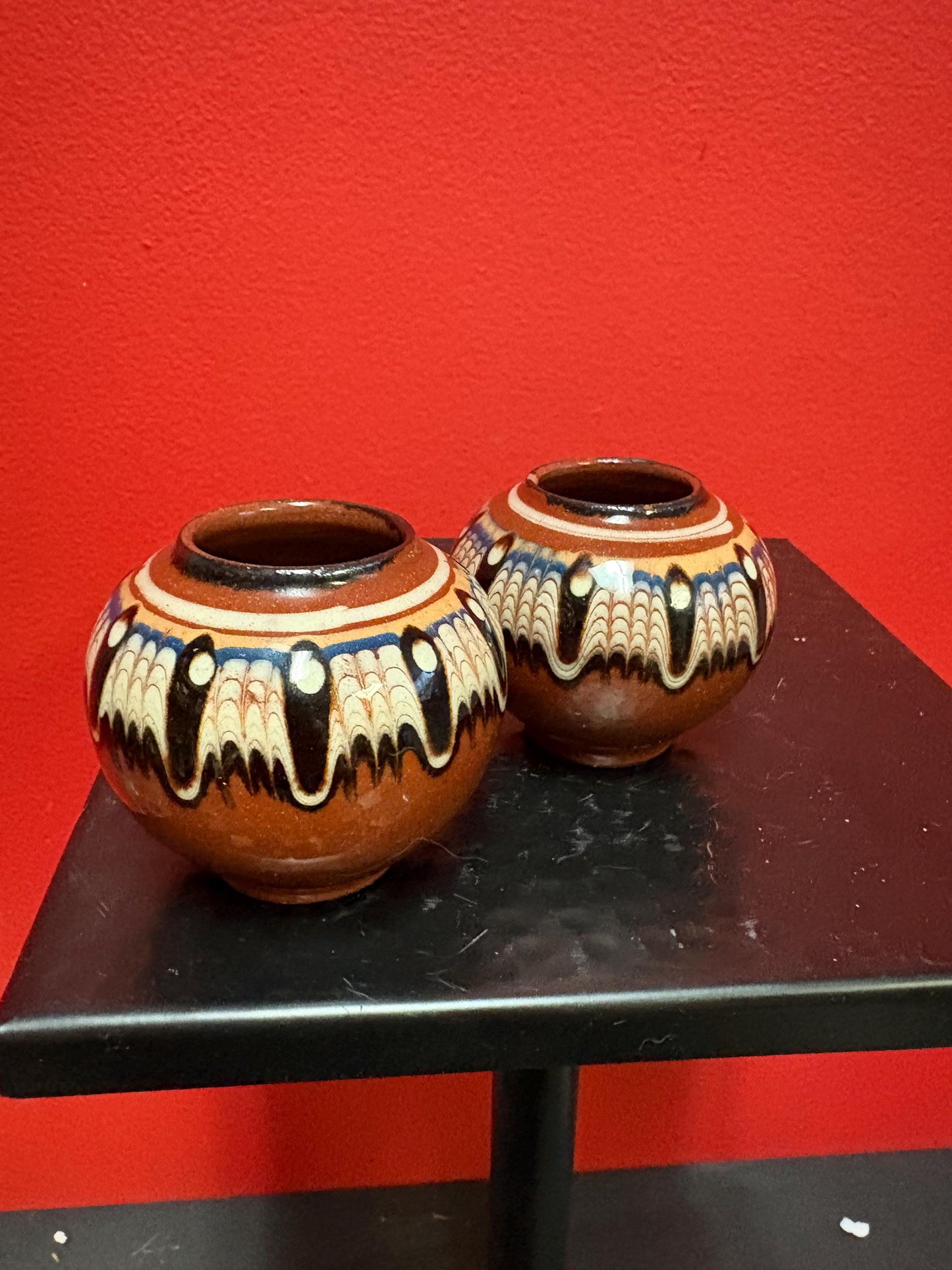 Lovely pair of 2 1/2 inch high South American terra-cotta painted pots  one chipped and one perfect  great value