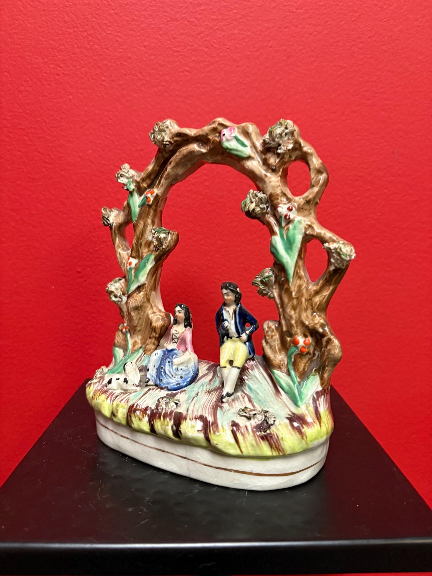 A 7 inch tall antique Staffordshire statue  great antique condition - see photos