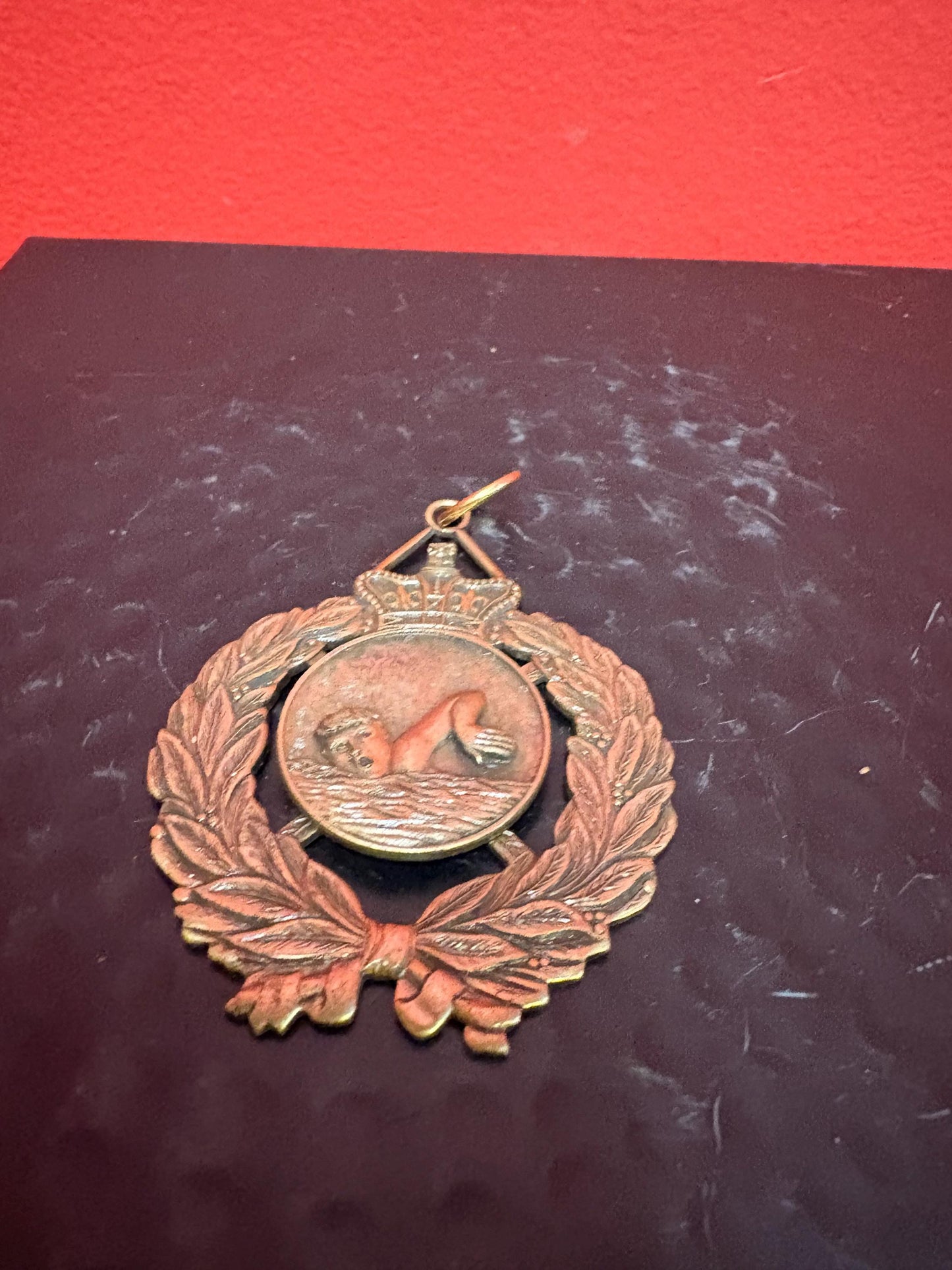 Lovely 3 inch long vintage metal swimming medal great gift