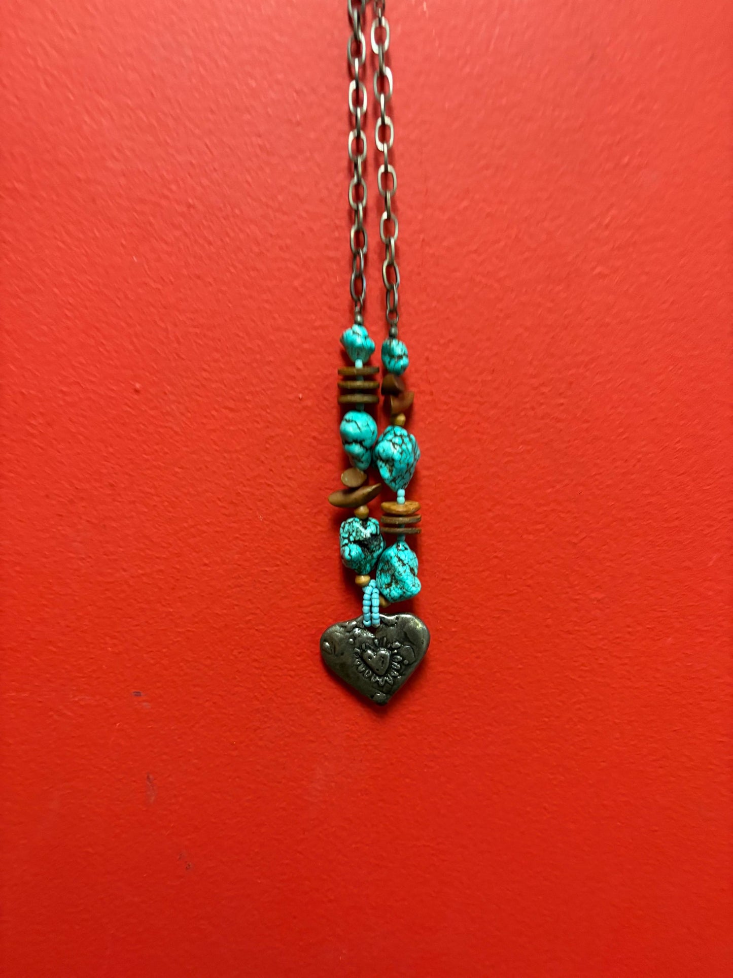 Lovely approximately 20 inch long Navajo style turquoise necklace with silver heart pendant unique and perfect gift