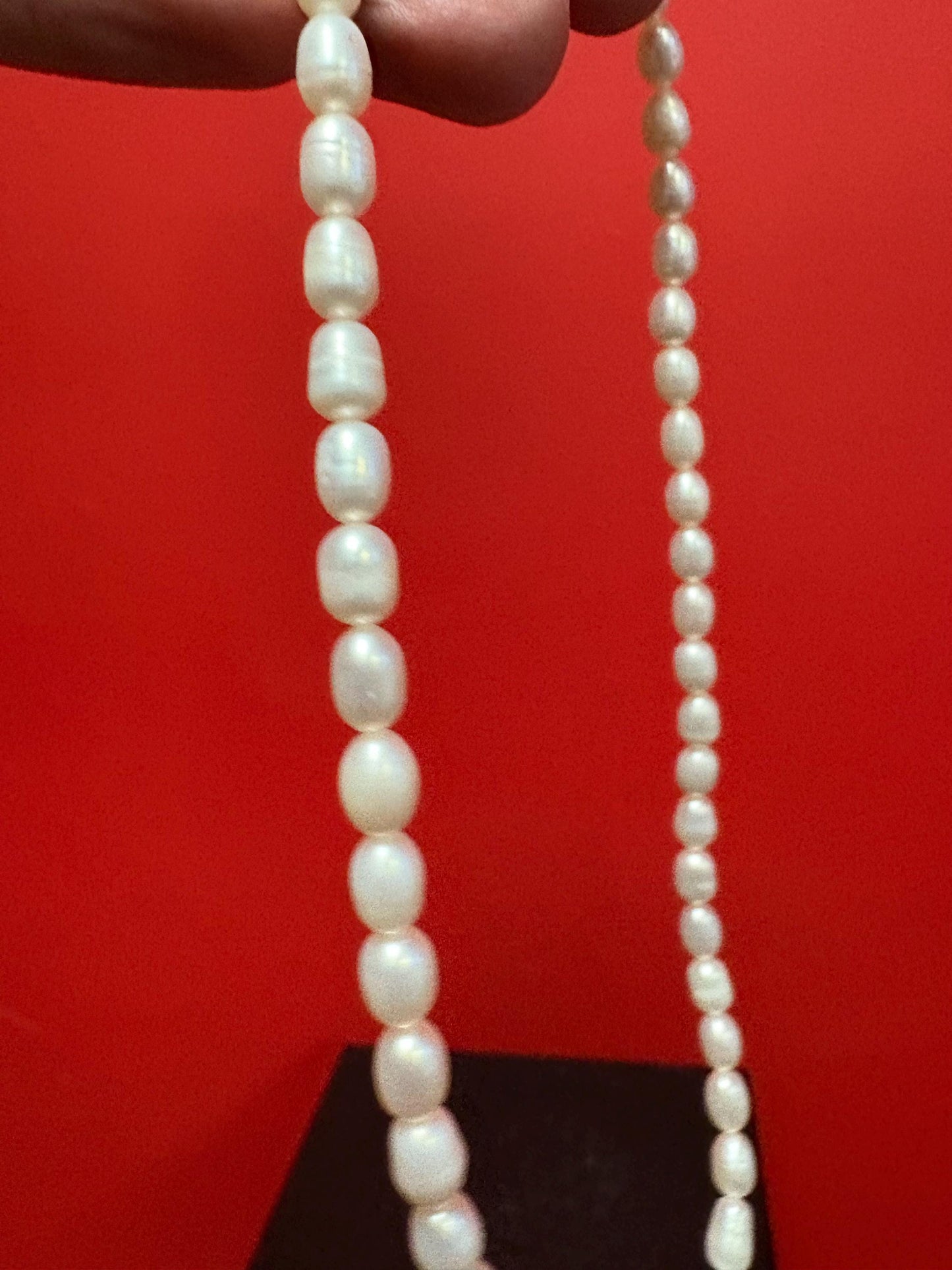 Beautiful approximately 15 inch long freshwater pearl necklace - with silver and amethyst charm unusual and wonderful price