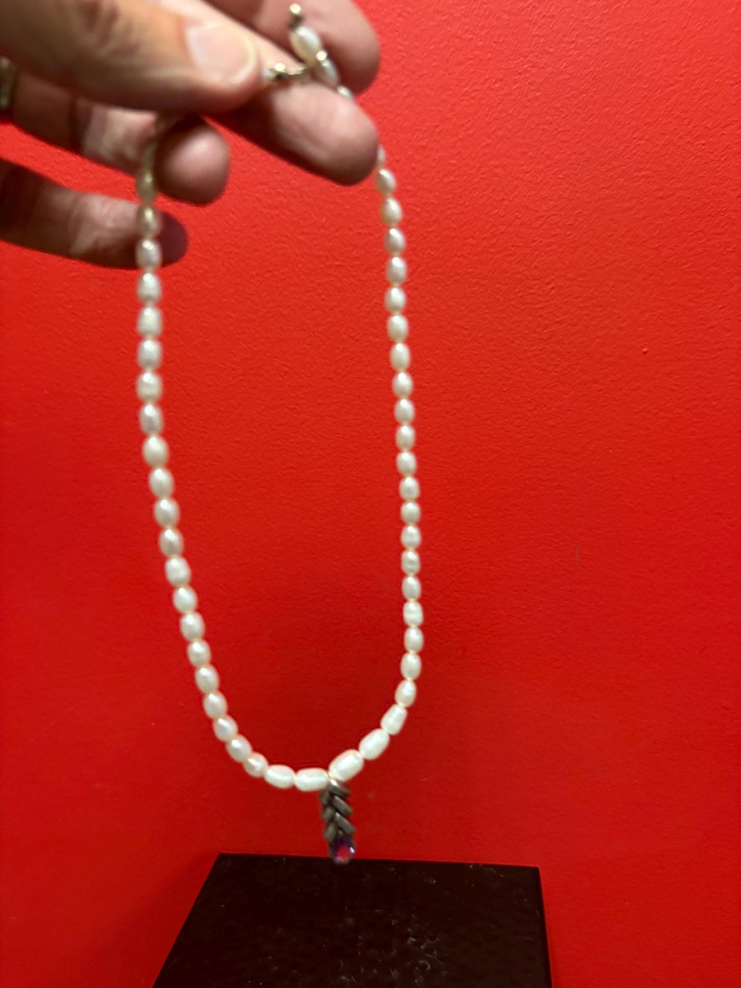 Beautiful approximately 15 inch long freshwater pearl necklace - with silver and amethyst charm unusual and wonderful price