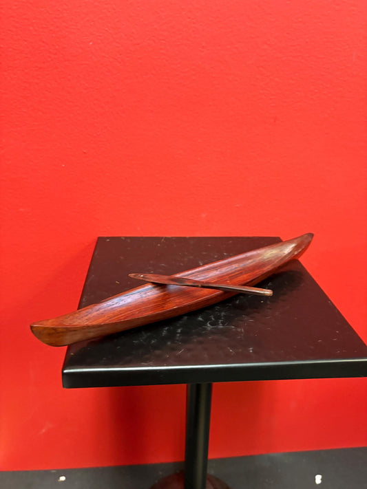 Lovely 10 inch  indigenous wooden model  canoe  simple and elegant with one paddle