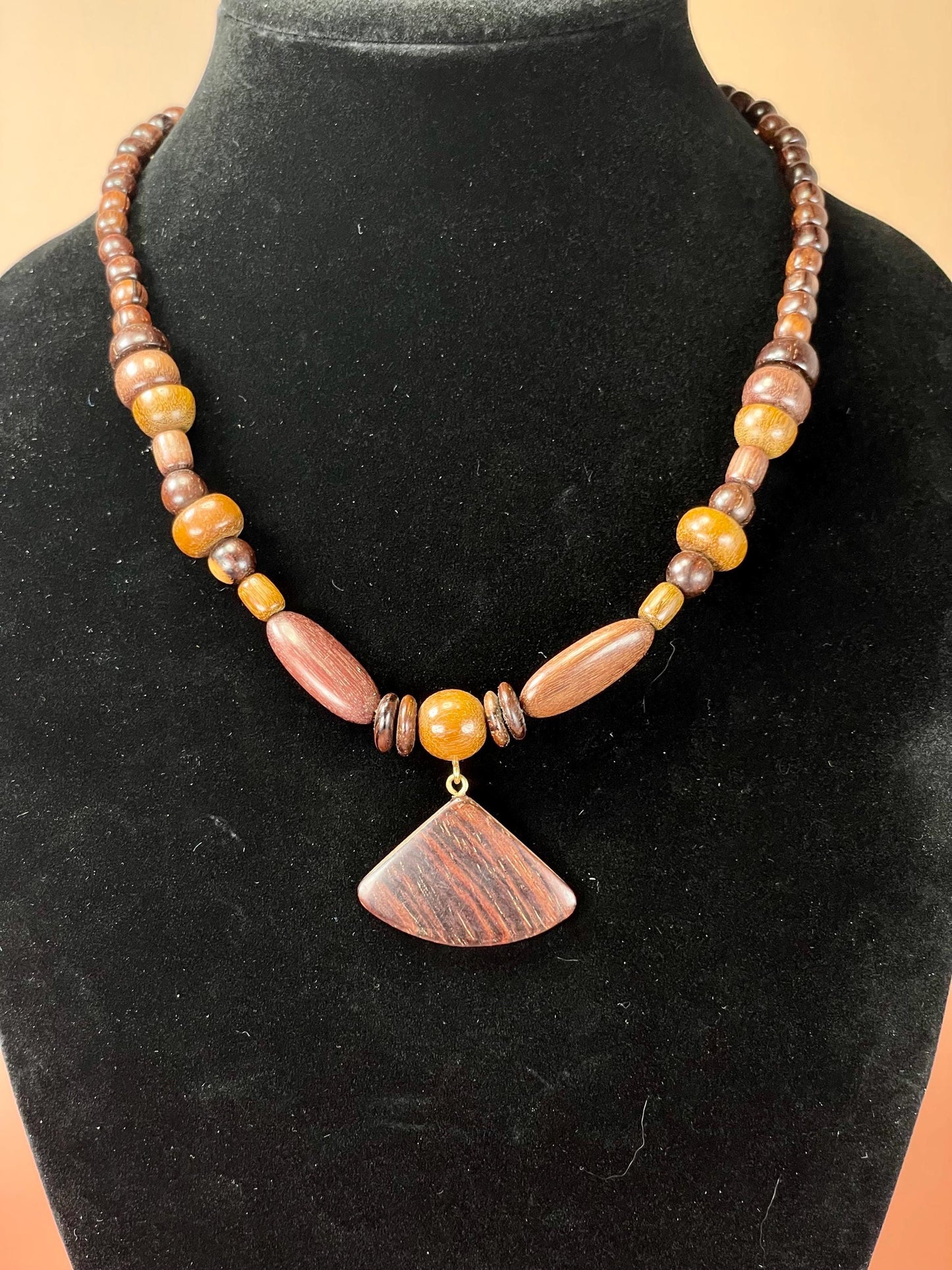 Lovely 20 inch long wood Beaded necklace with 1 inch pendant