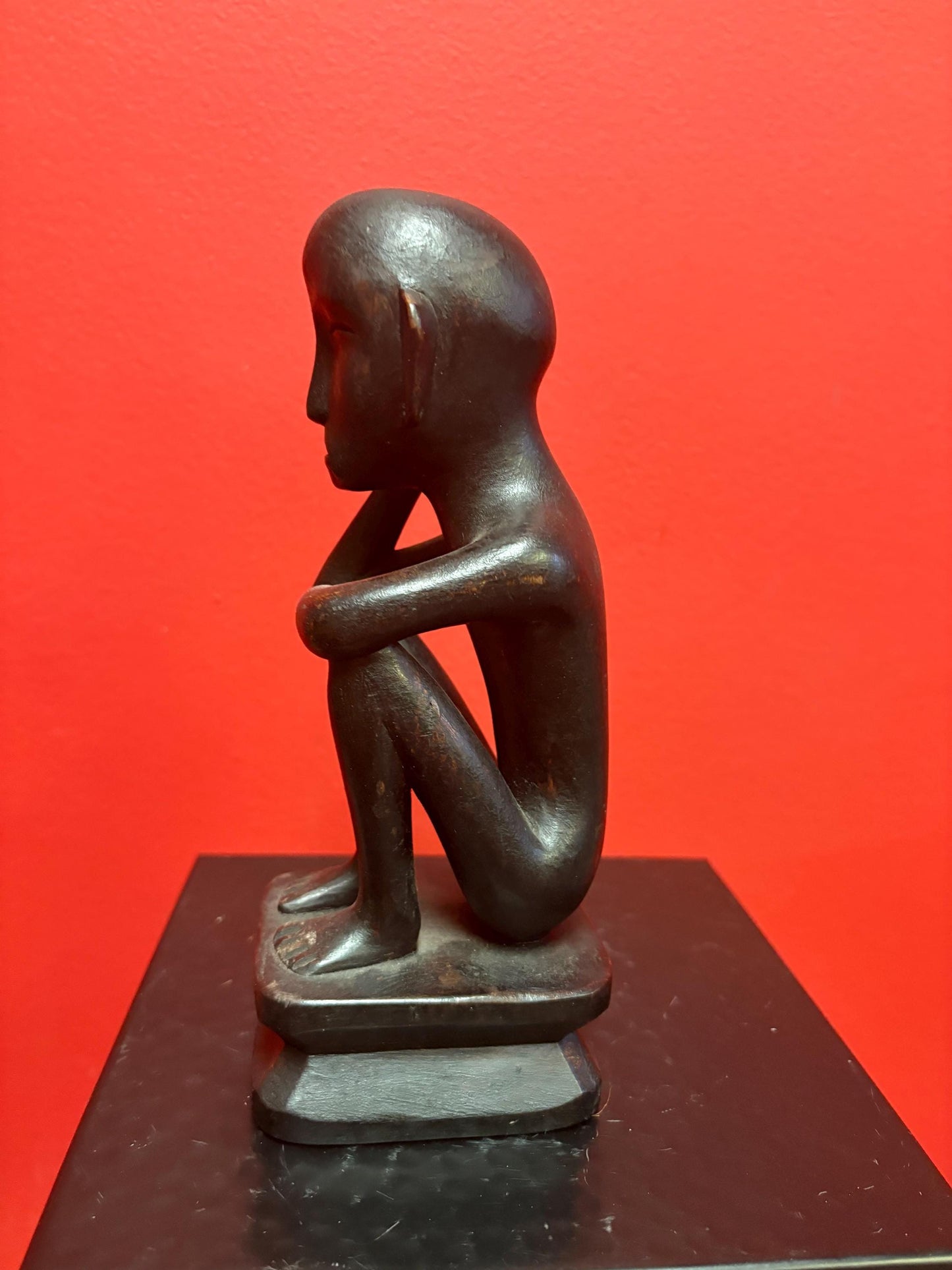 Lovely African old 8 inch tall thinking man seated great patina