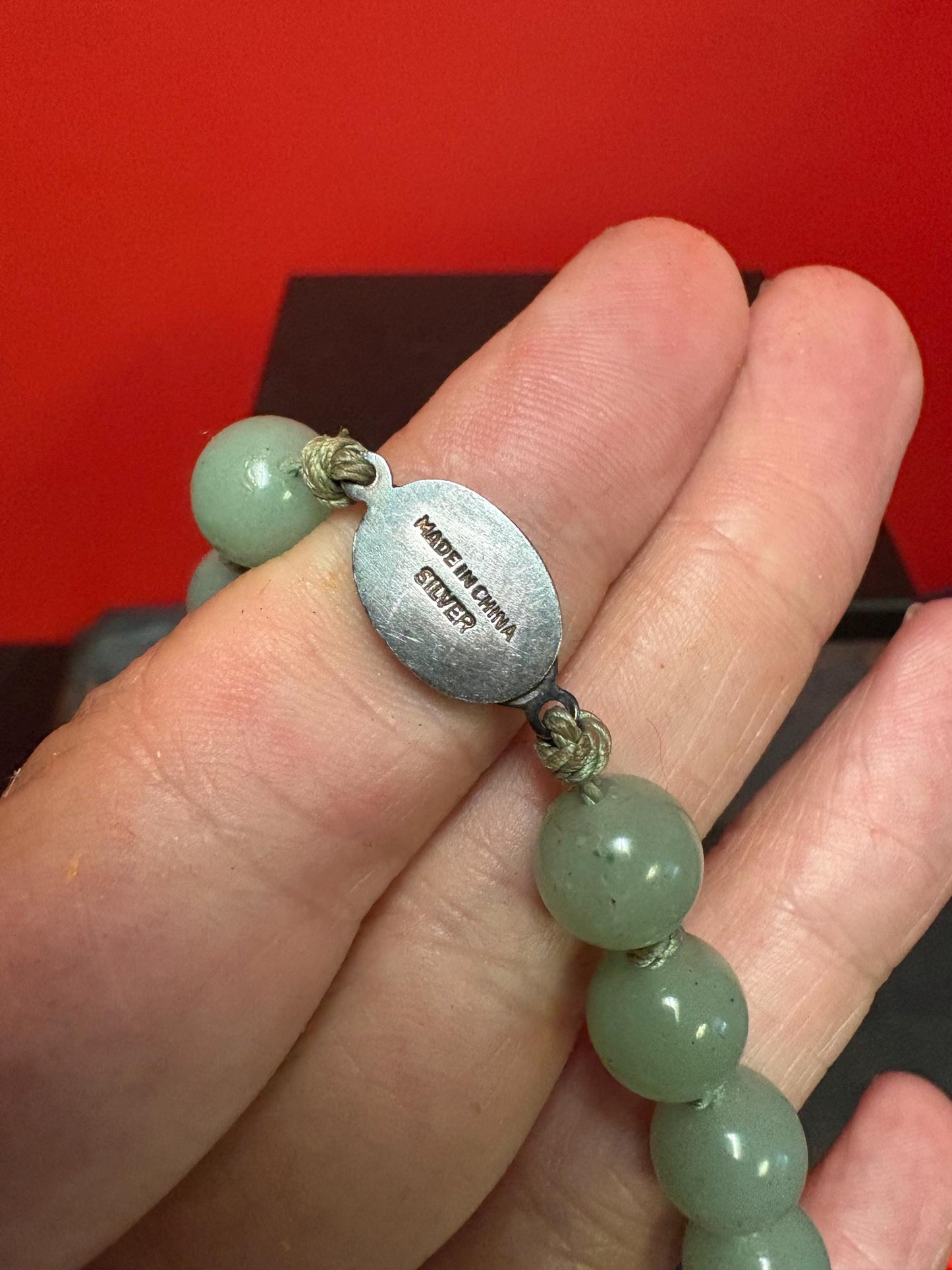 Vintage Chinese high-quality jade bead necklace with sterling silver clasp approximately 25 inches great knotting wonderful gift