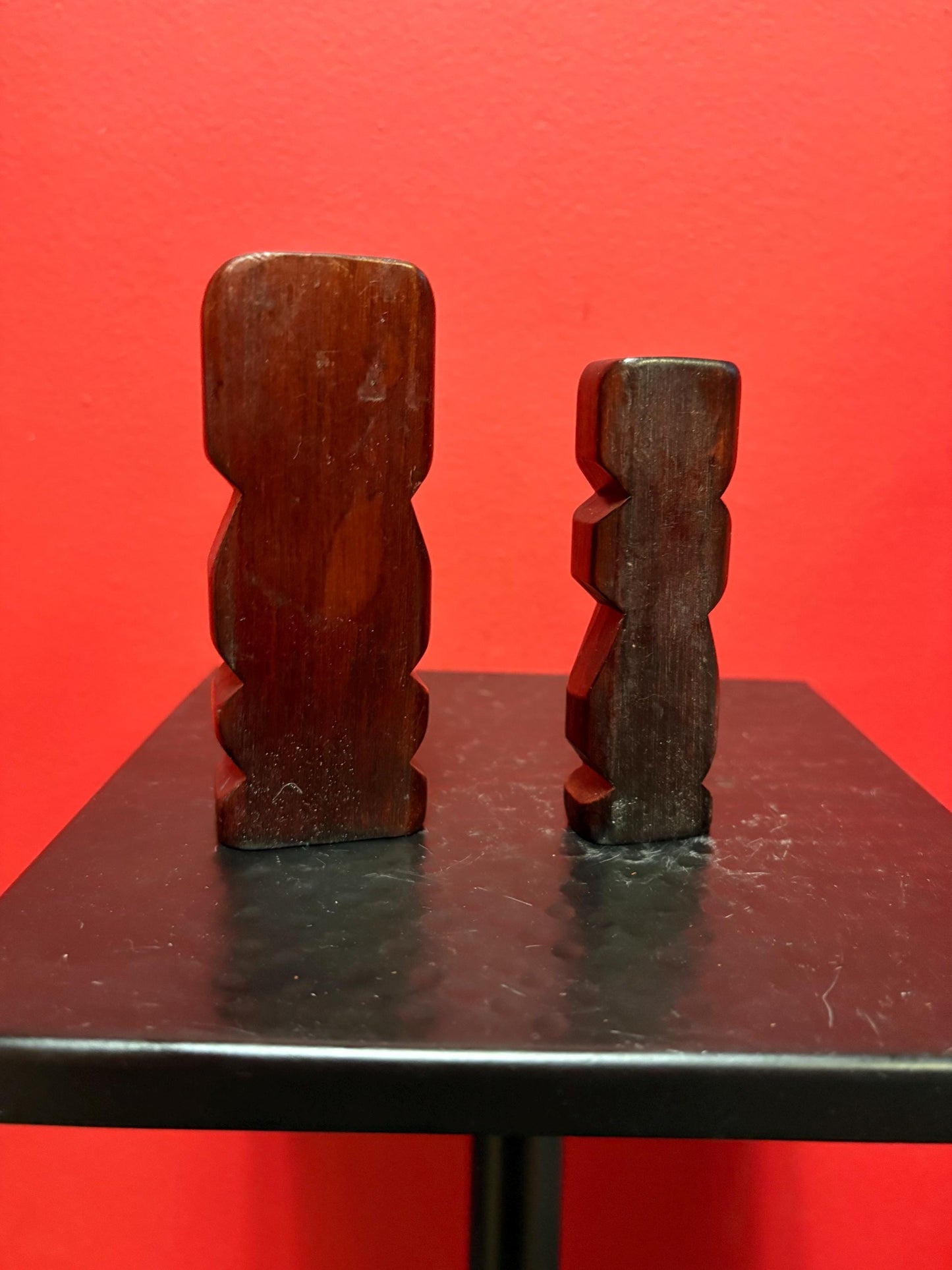 Two beautiful New Zealand Maori statues with abalone inset 4.5 and 4 inches tall sold as pair Maori