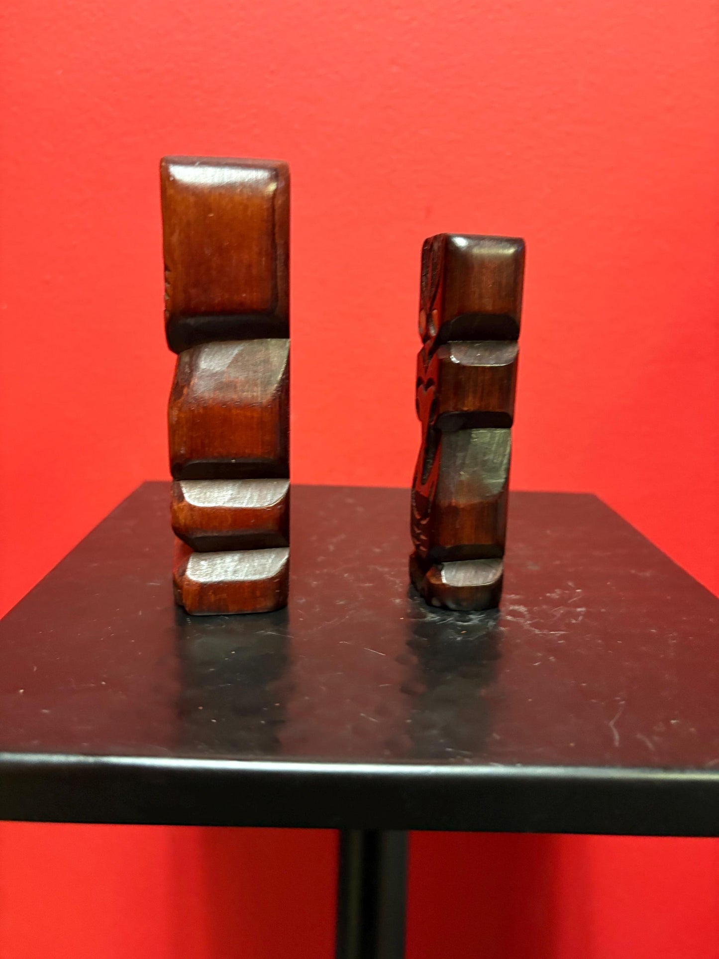 Two beautiful New Zealand Maori statues with abalone inset 4.5 and 4 inches tall sold as pair Maori
