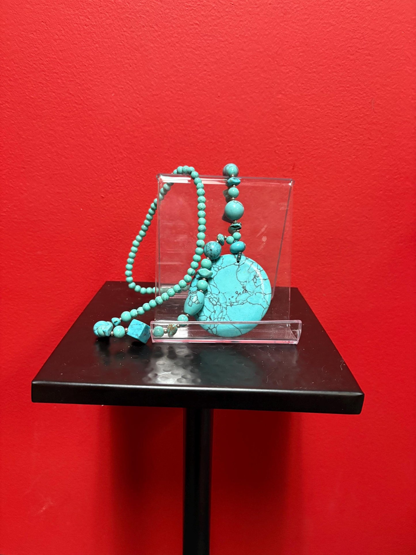 Beautiful turquoise necklace approximately 26 inches long with a 3 inch pendant great value