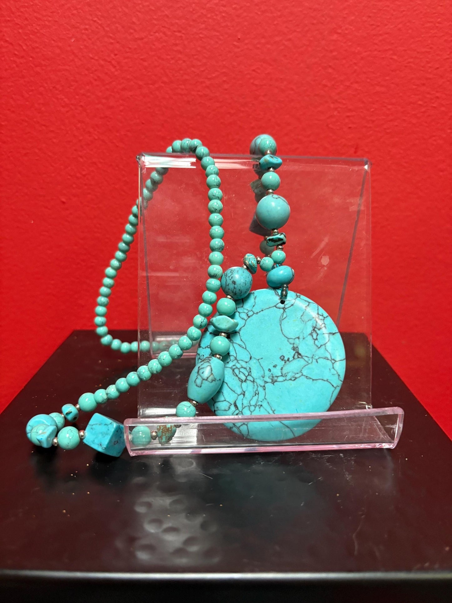 Beautiful turquoise necklace approximately 26 inches long with a 3 inch pendant great value