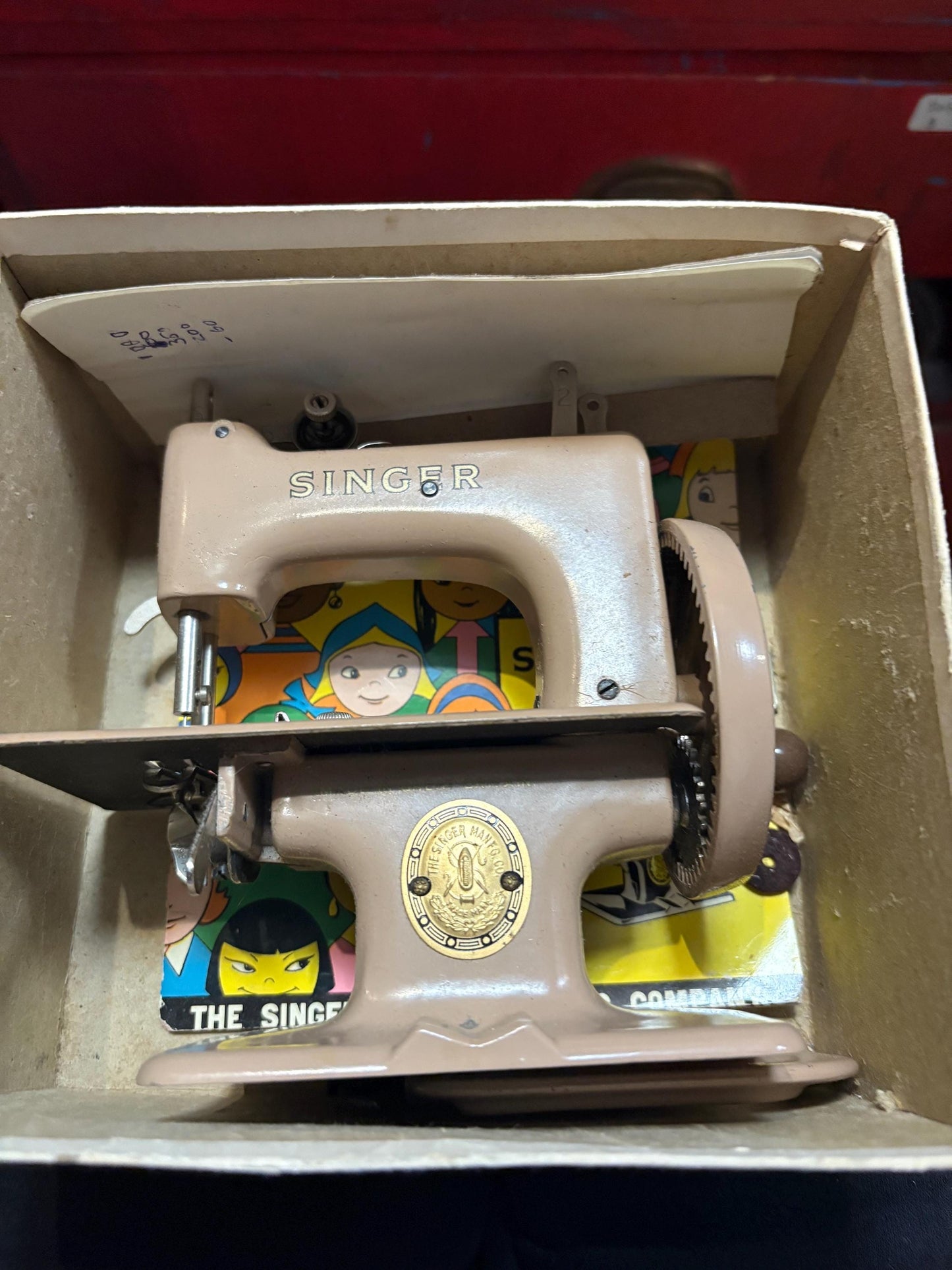 Amazing vintage like new rare singer sew handy children sewing machine  seems to work  great colour with instructions and box