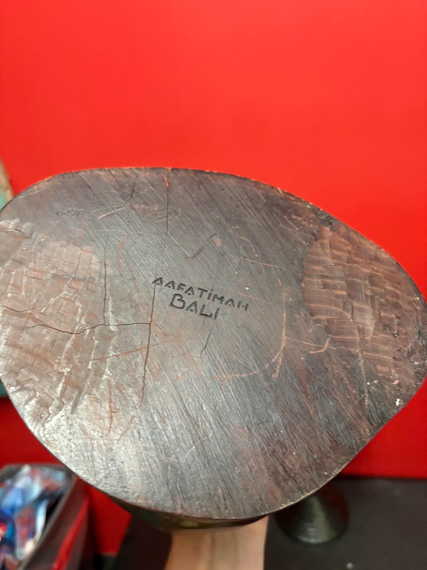 Stunning Indonesian signed antique heavy wooden statue of a man 12.25 inches high - striking imagery great gift good value