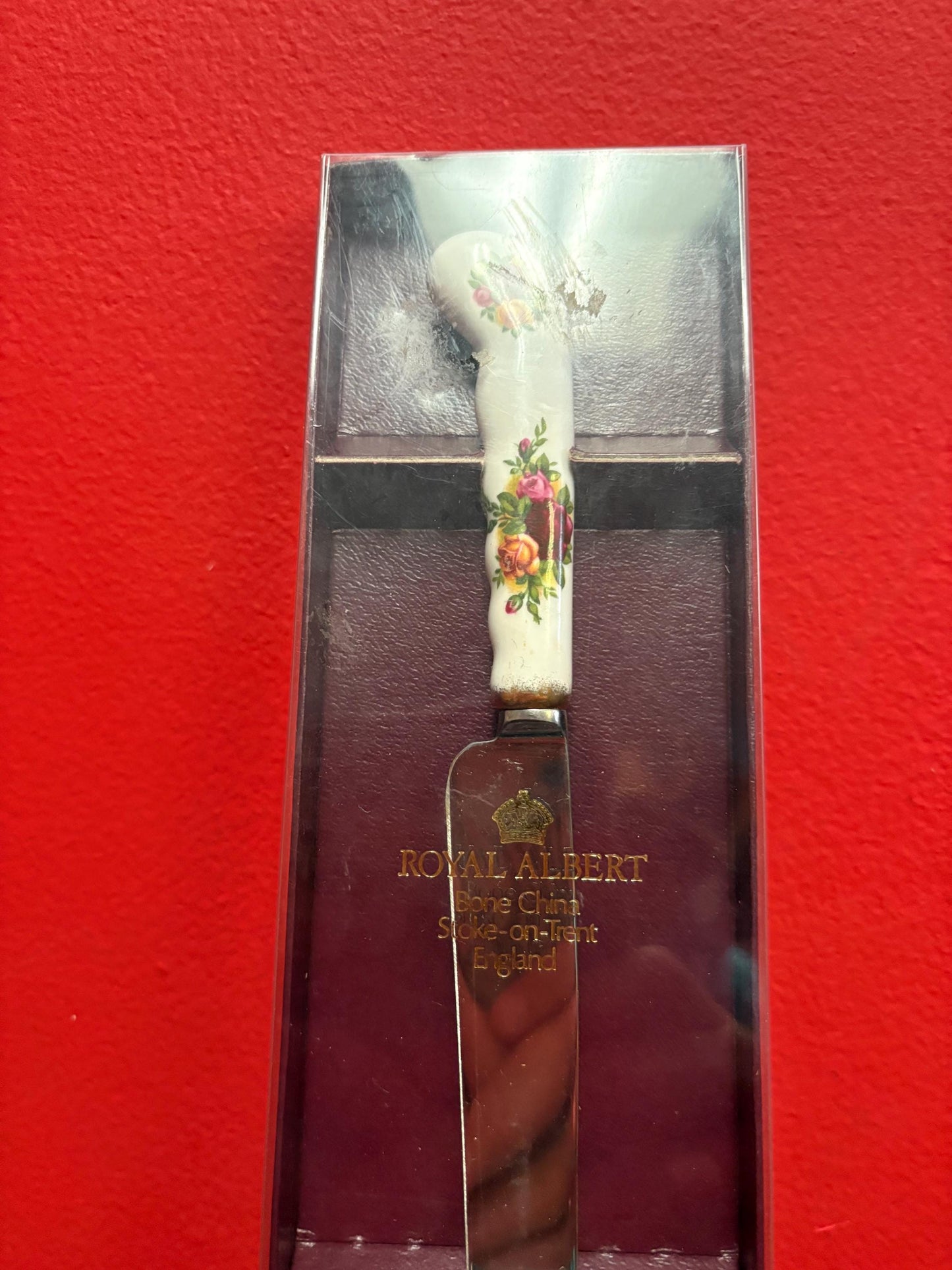 Royal Albert old country Rose 9 1/2 inch long bread knife in original box  brand new condition- wow
