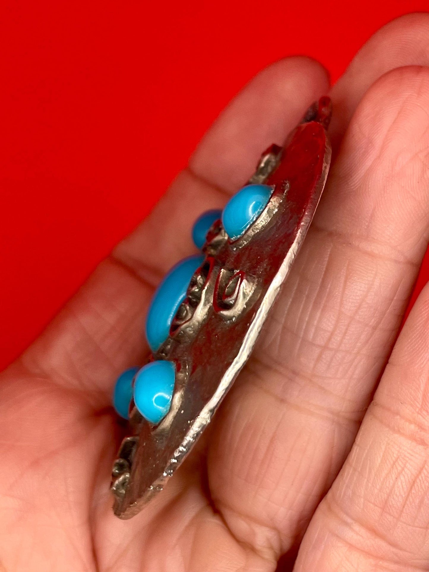 Round Hammered Metal Pendant with blue beads and Scroll Design