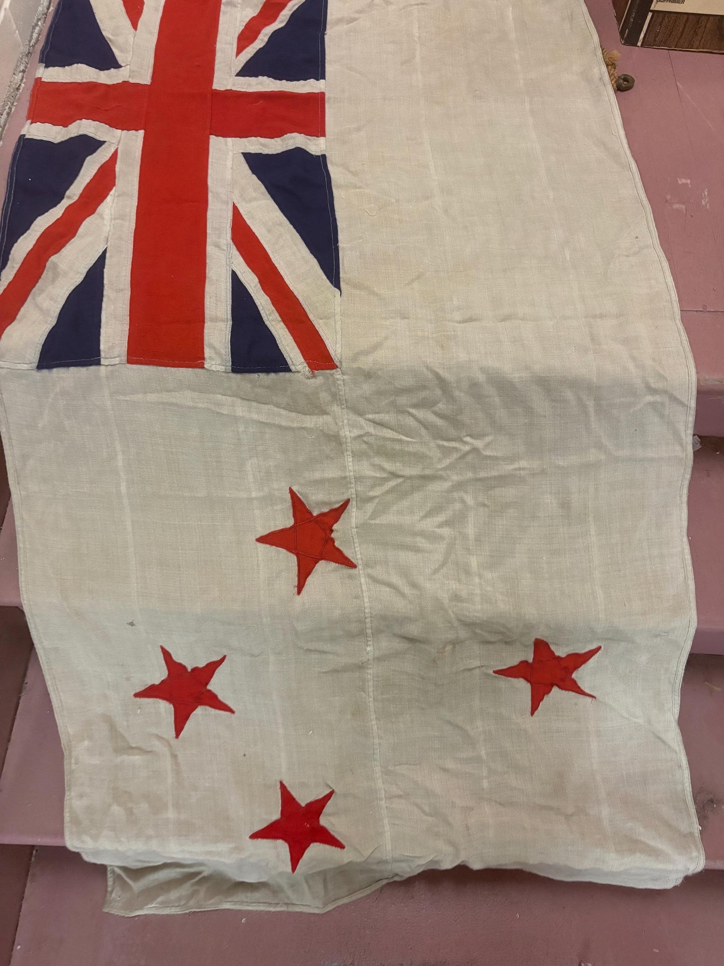 Stunning antique approximately 62 x 30 inch New Zealand flag with hardware  pretty good condition but see photos  great value