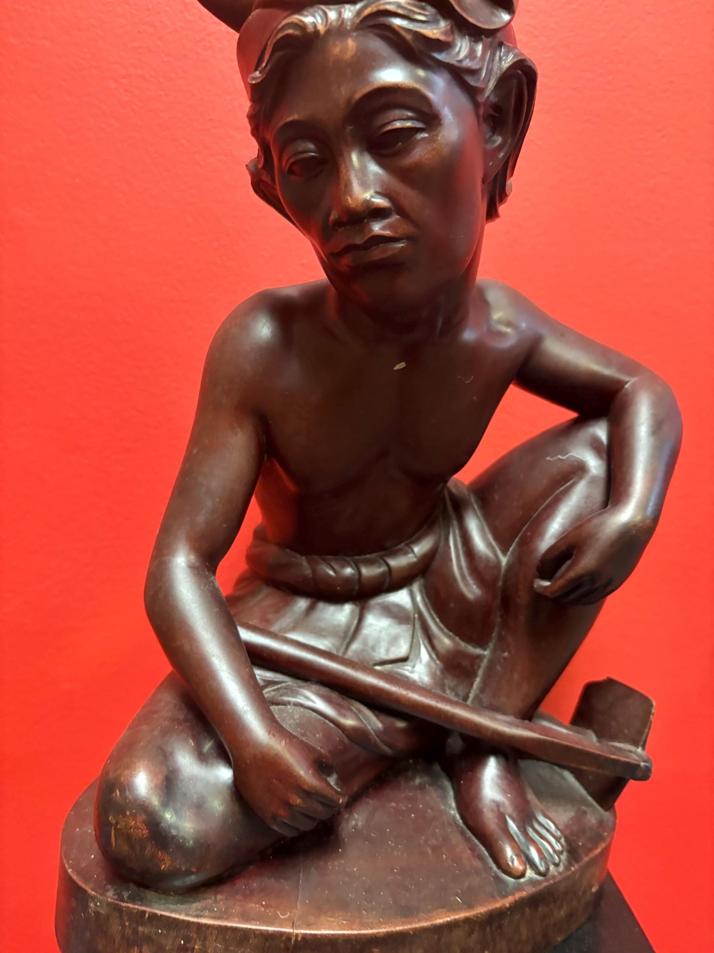 Stunning Indonesian signed antique heavy wooden statue of a man 12.25 inches high - striking imagery great gift good value