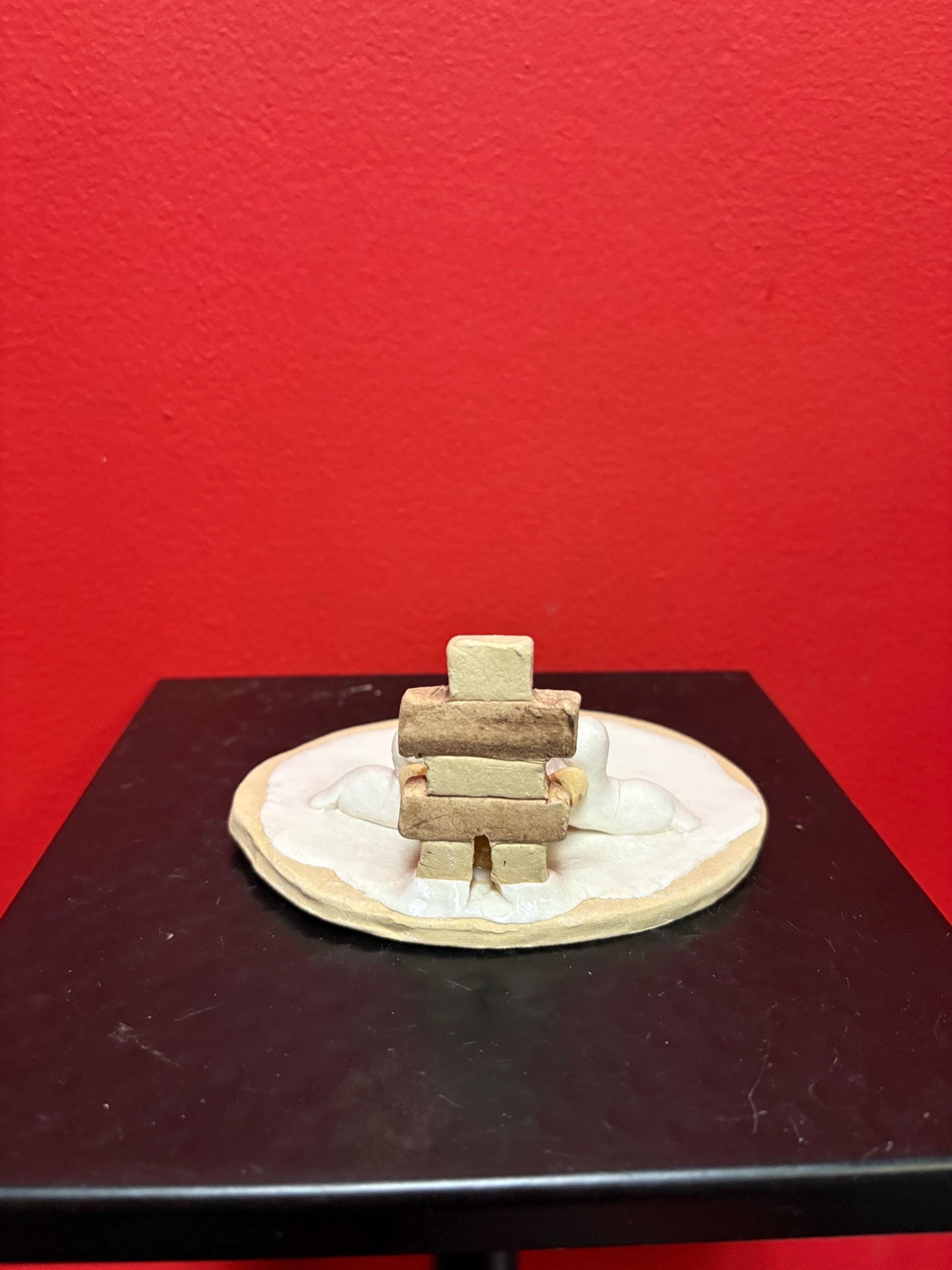 Beautiful indigenous statue of an Eskimo and seals and an Inukshuk  5 x 2 1/2“ high signed  2 available