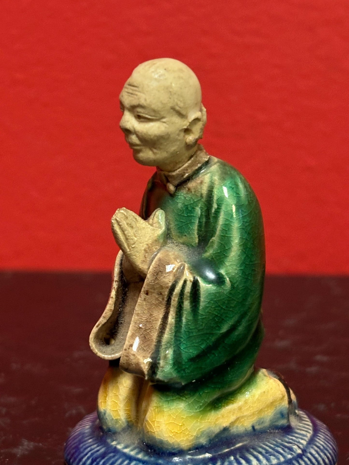 Beautiful 3 inch tall Chinese mud man praying in great condition unusual subject