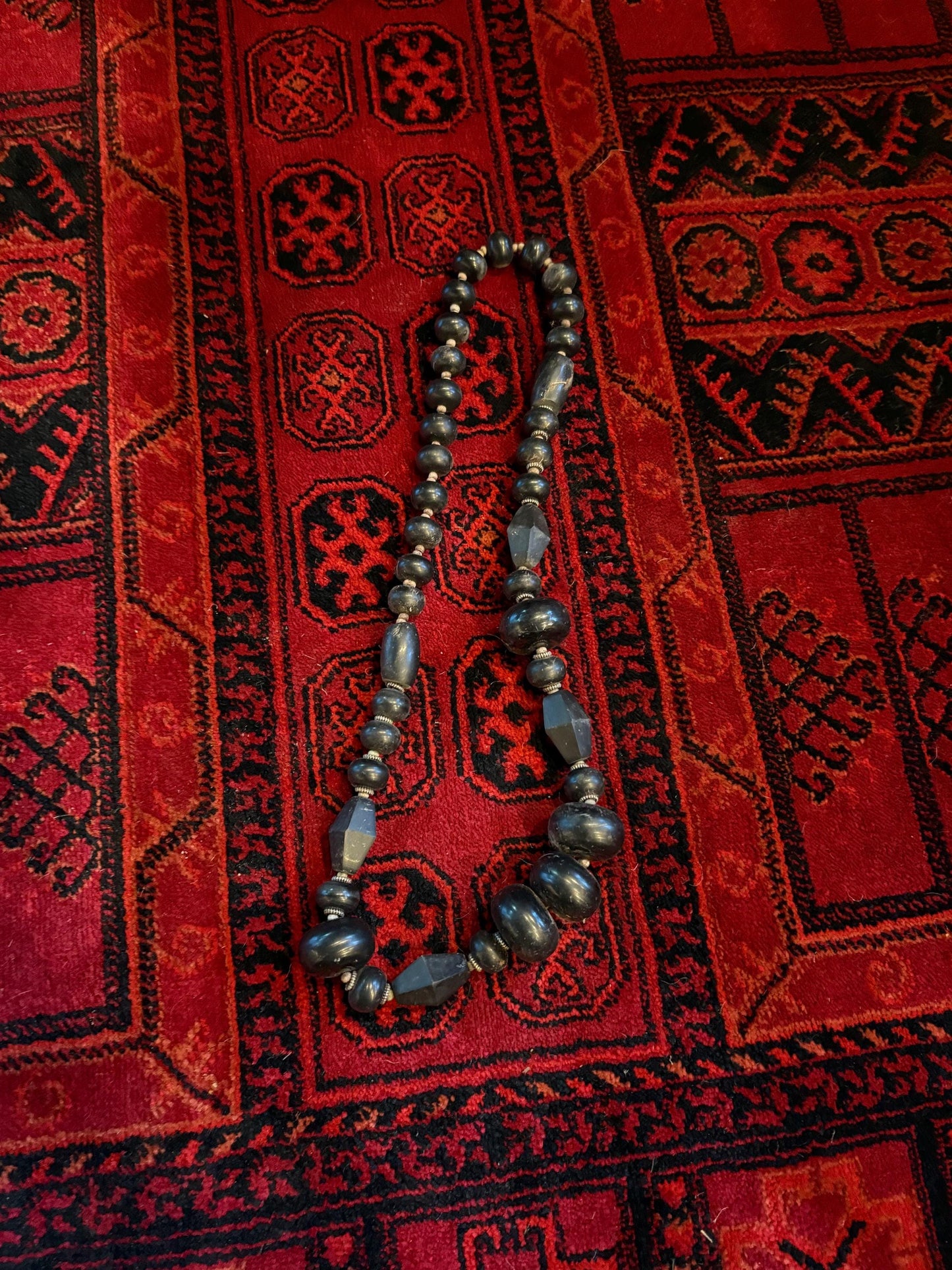 Approximately 30 inch antique Nepalese horn bead necklace with silver rivets selling quality and great value