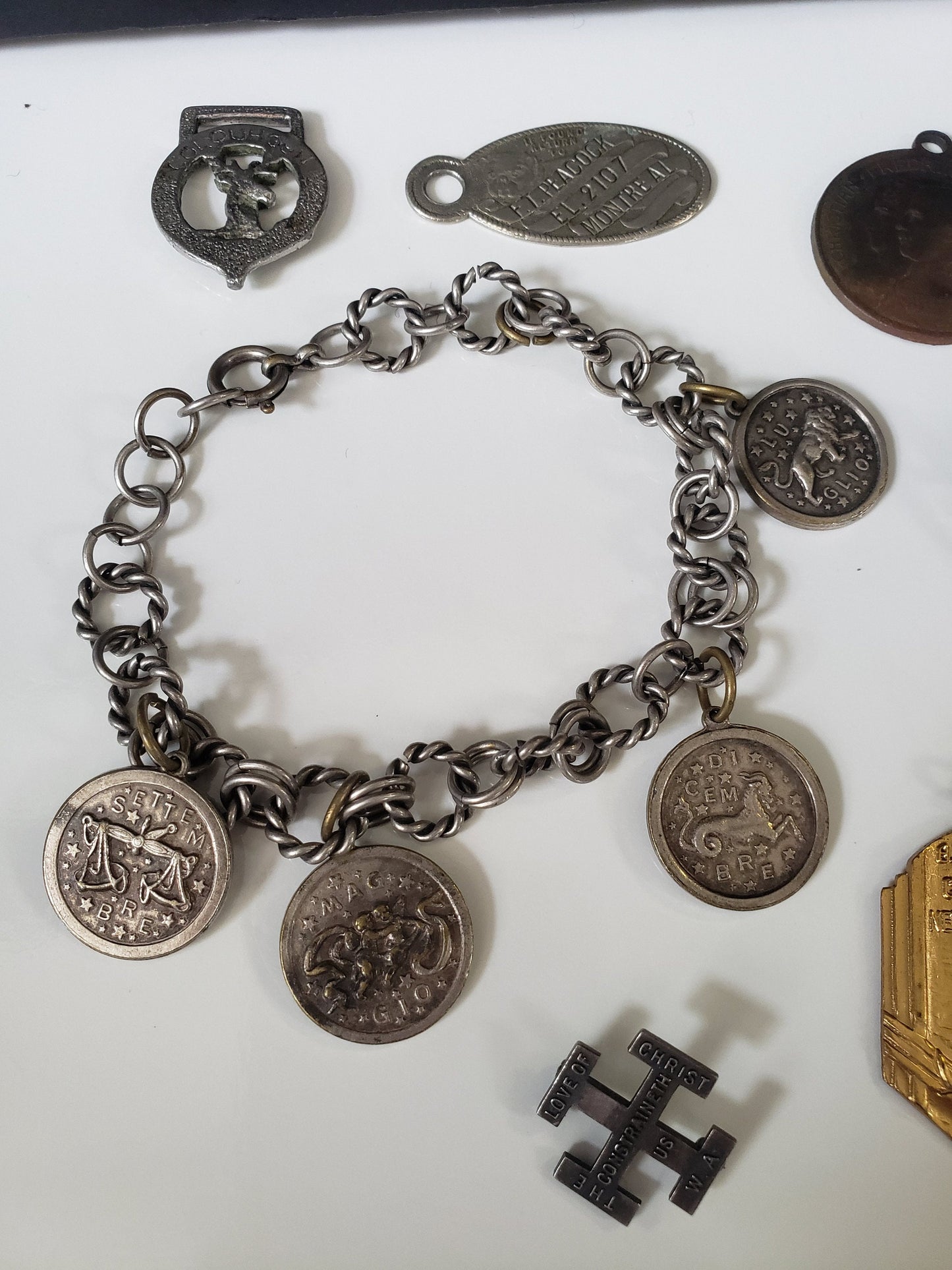 Assorted Lot of Small Medals, Brooches, and Charms