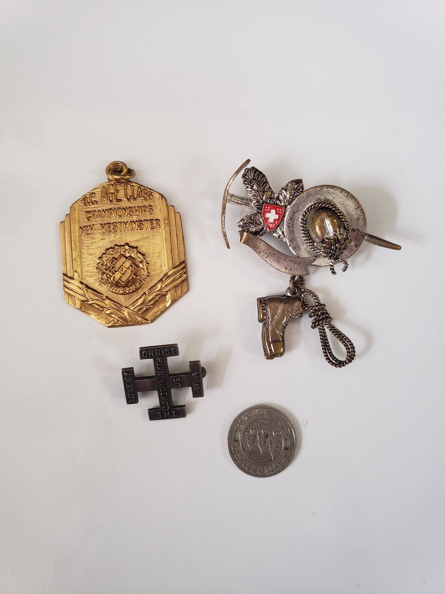 Assorted Lot of Small Medals, Brooches, and Charms