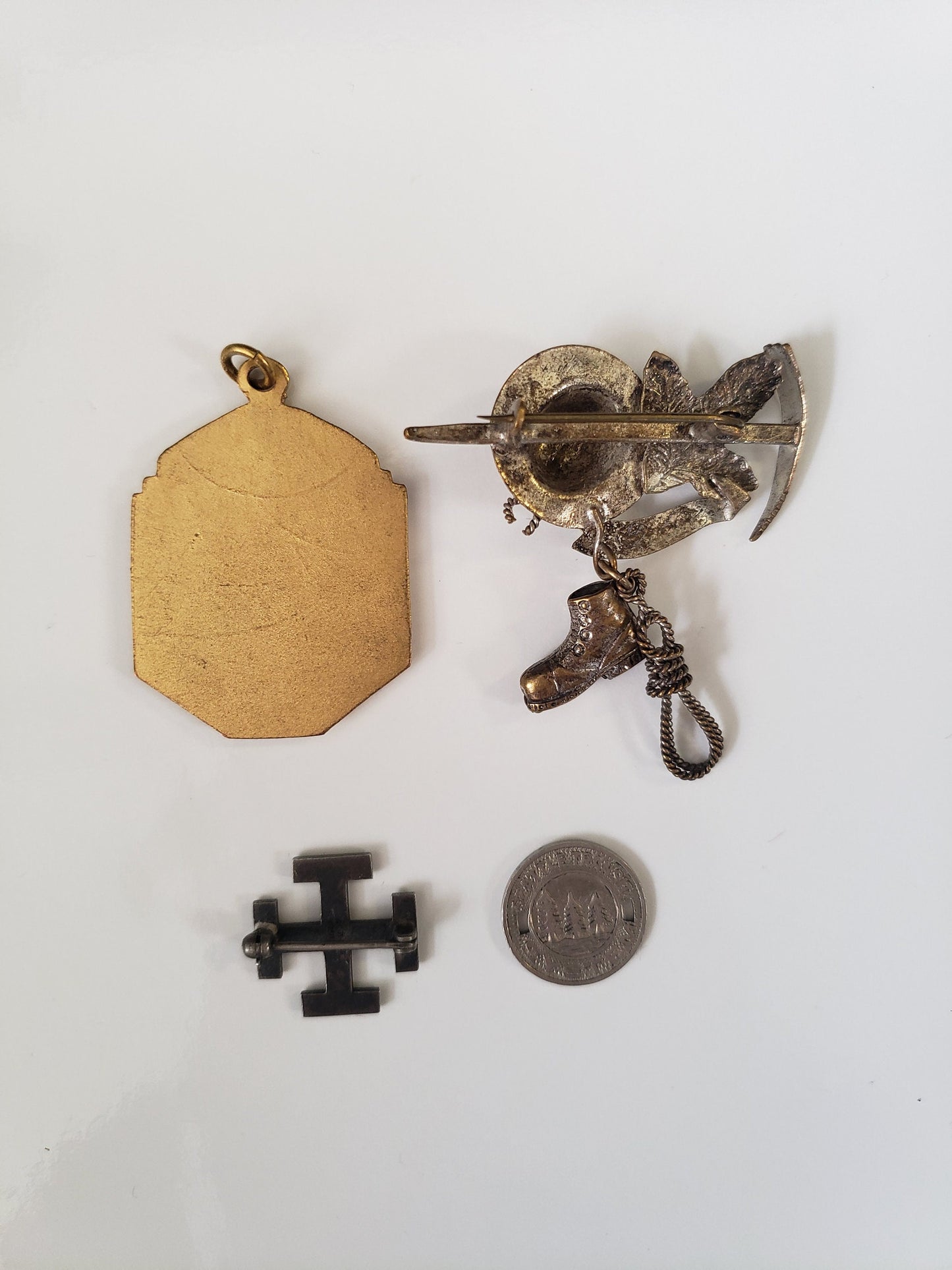 Assorted Lot of Small Medals, Brooches, and Charms