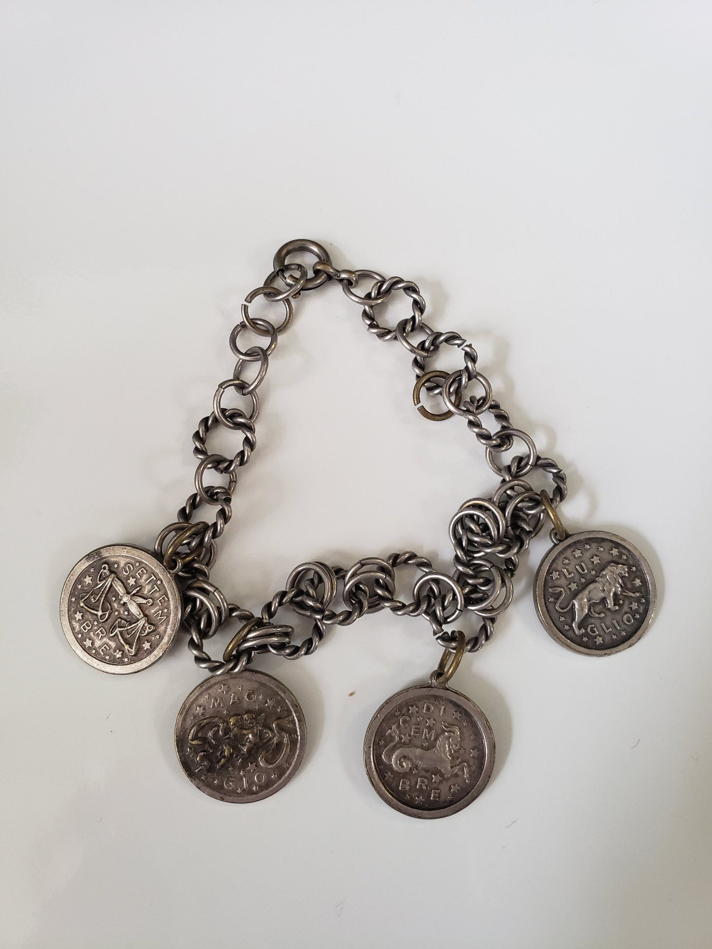 Assorted Lot of Small Medals, Brooches, and Charms