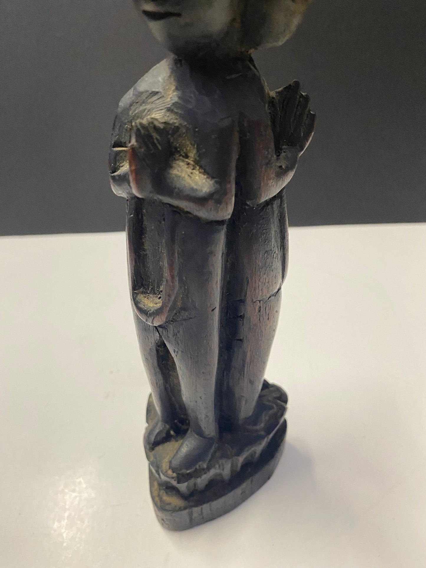 South East Asian carved 3 sided figure praying