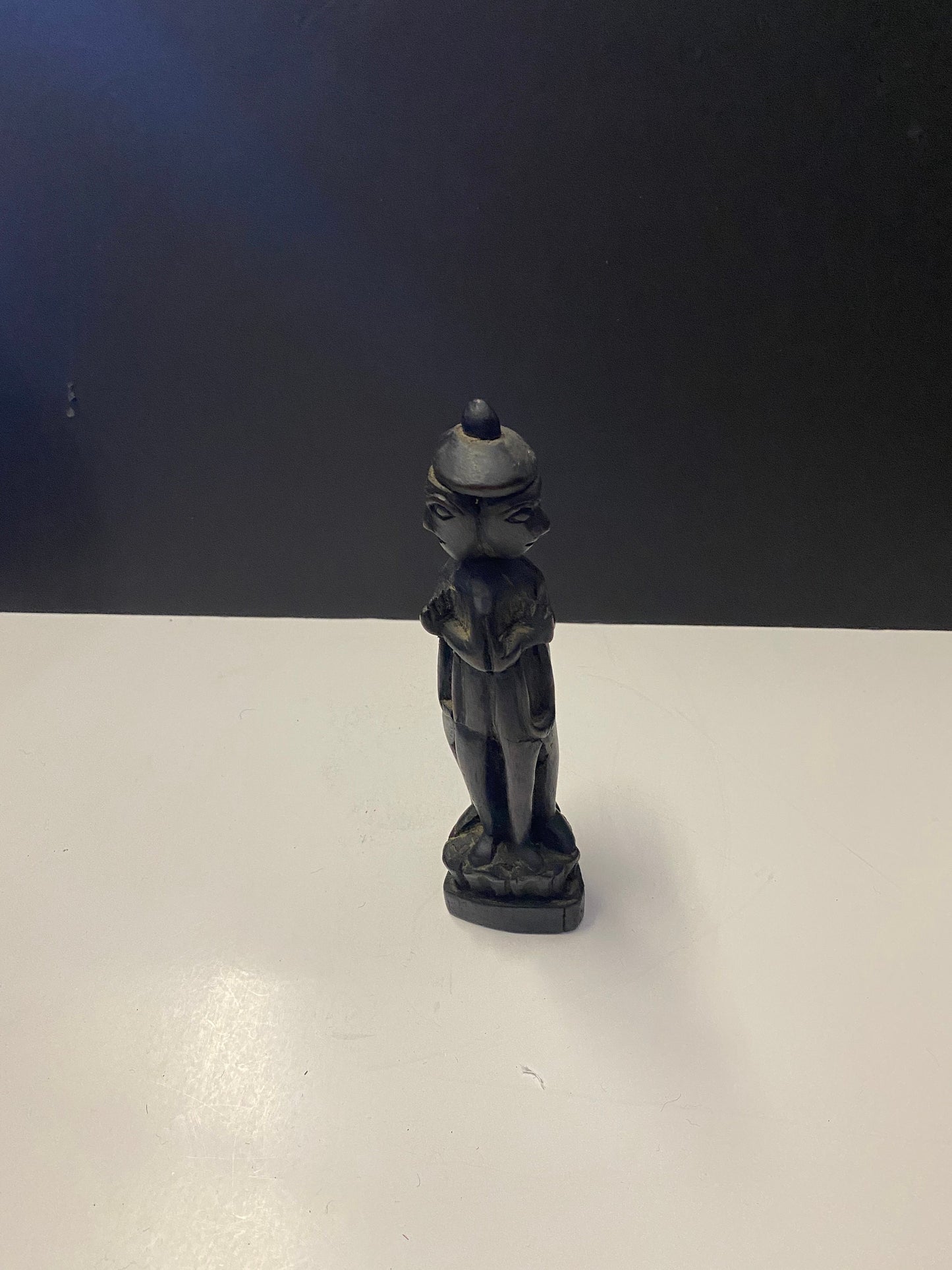 South East Asian carved 3 sided figure praying