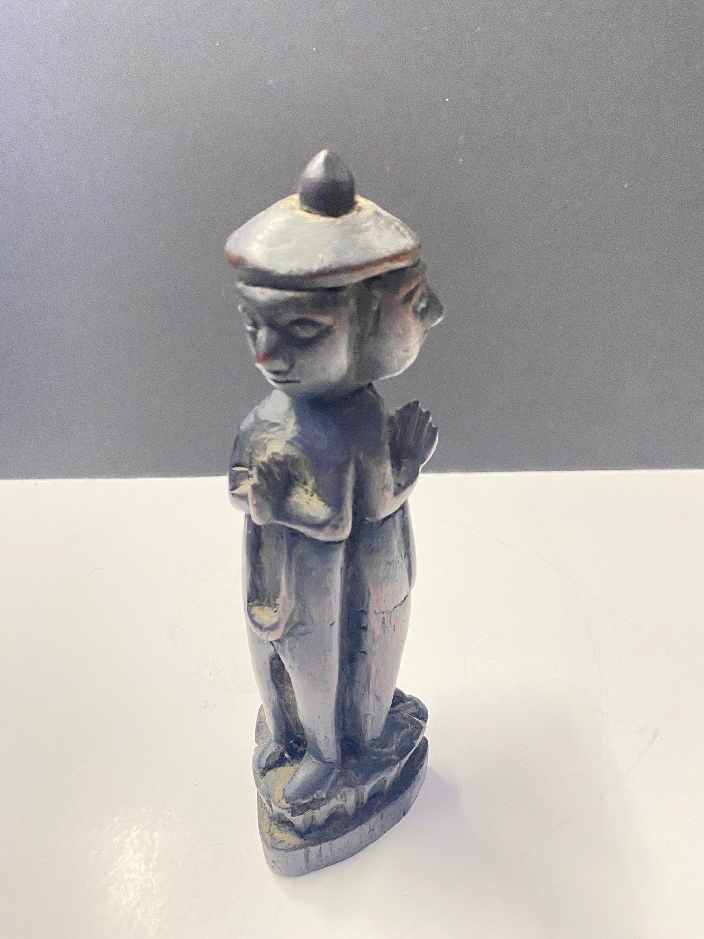 South East Asian carved 3 sided figure praying