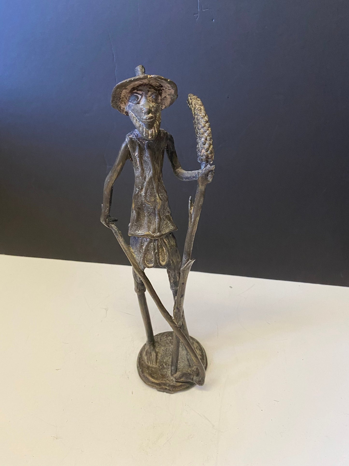 African Benin bronze 14 inch statue of a farmer