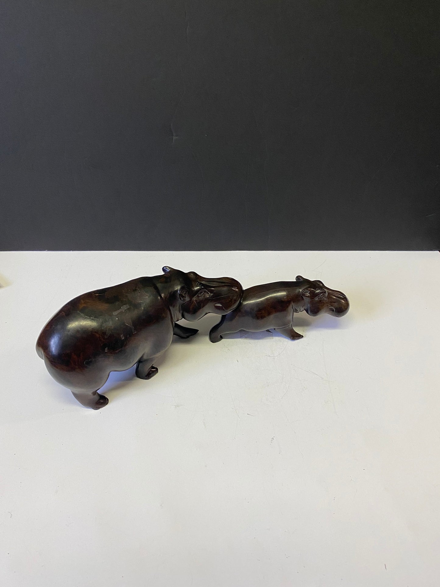 A  Spectacular 13 inch pipe African vintage Ebony wood hippos  mother and child hippopotamus   Has to be seen to be truly appreciated